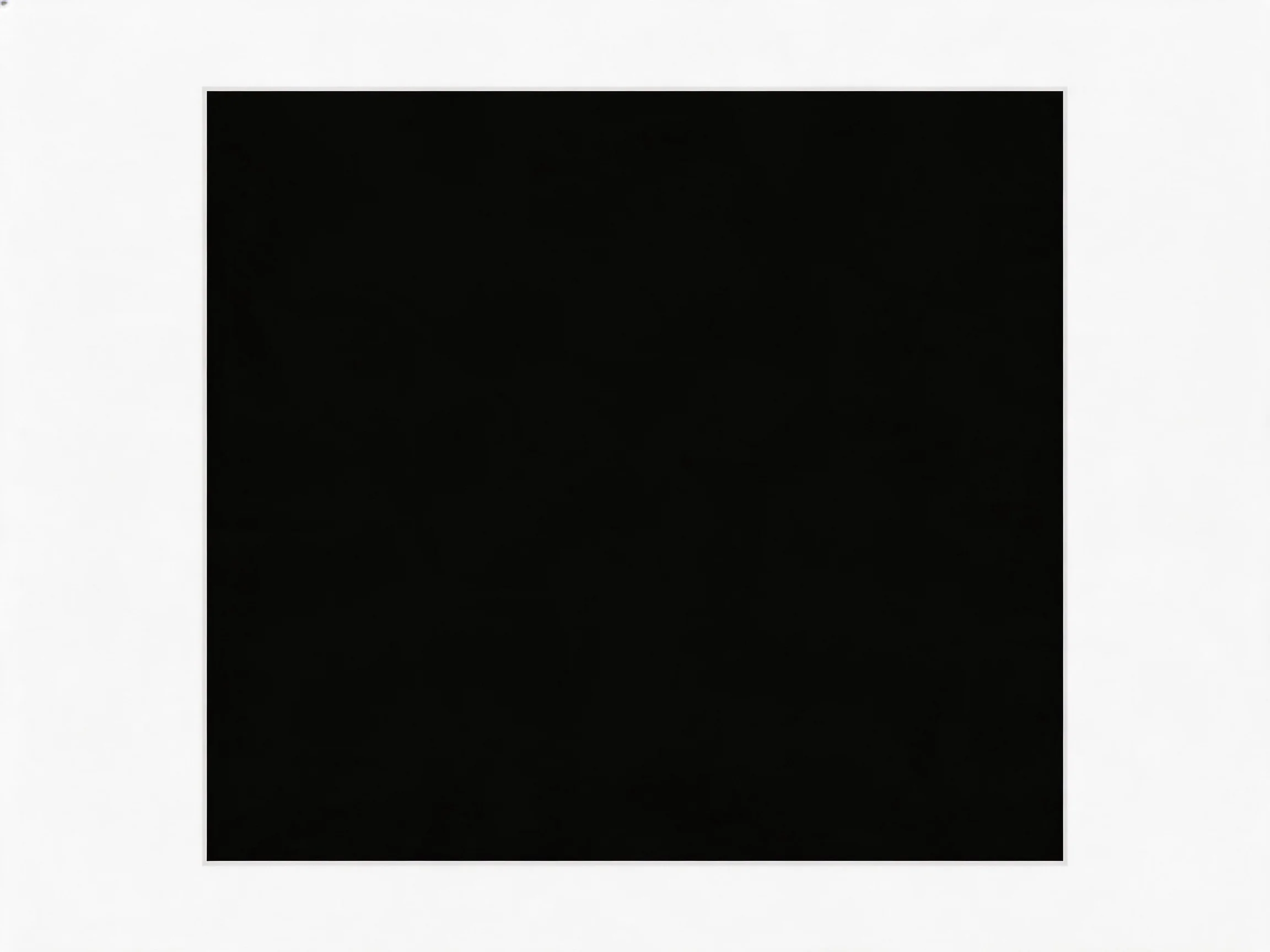 A solid black square centered on a white background