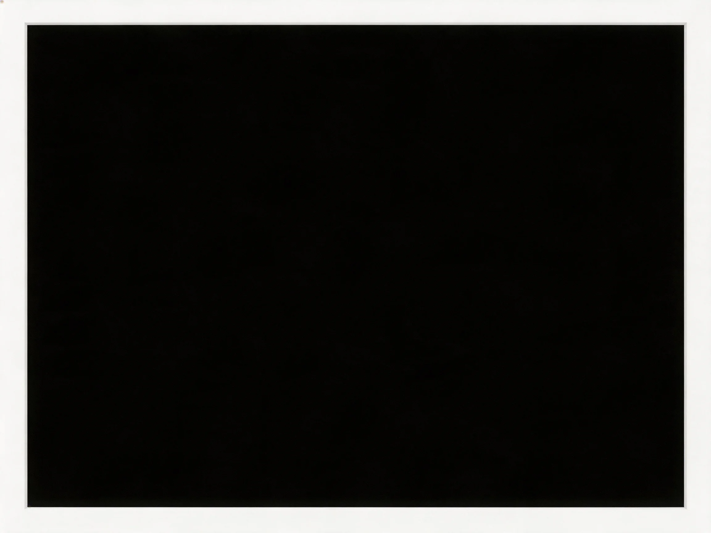 A solid black square with a thin white border