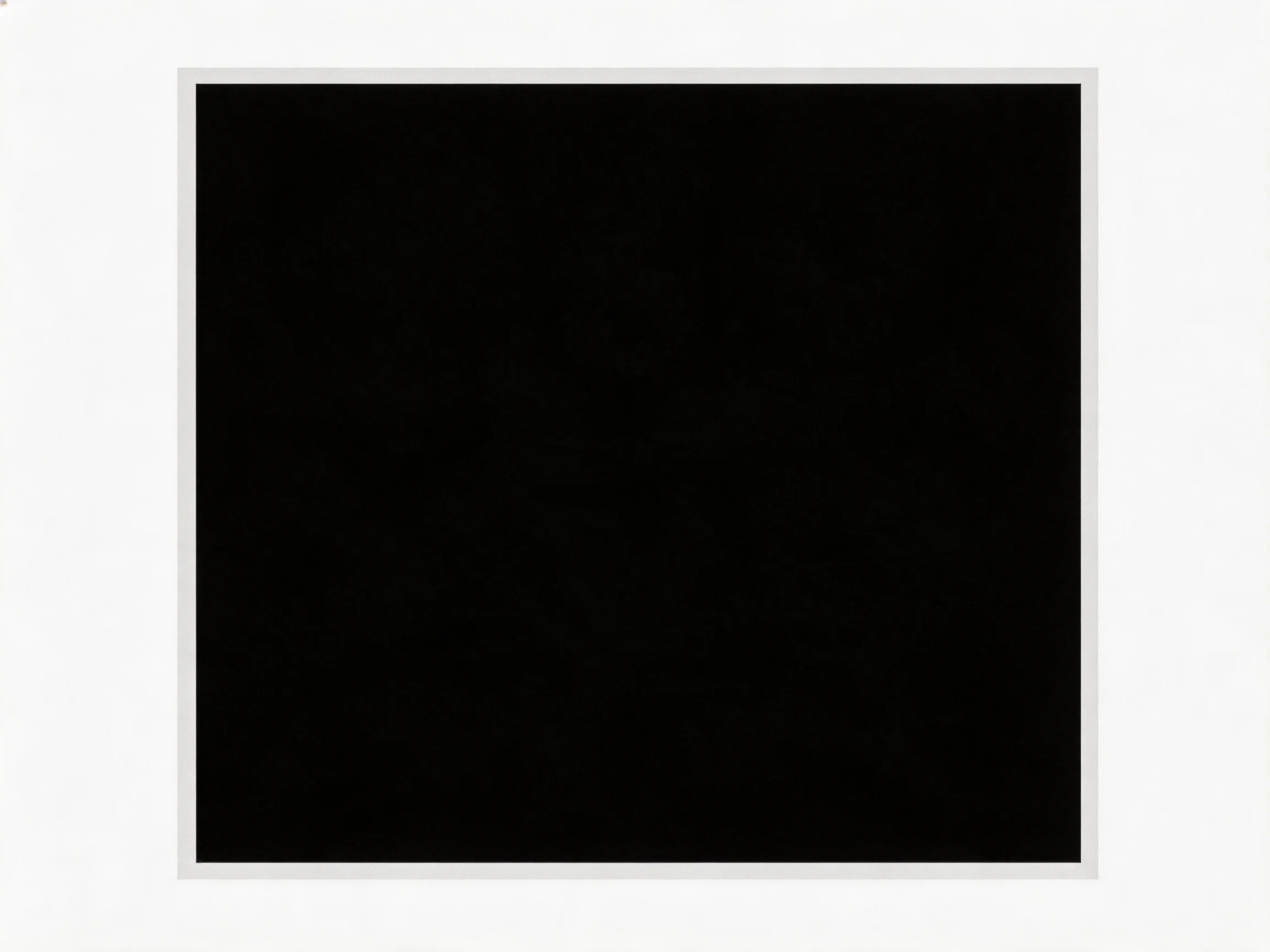 A solid black square with a thin white border