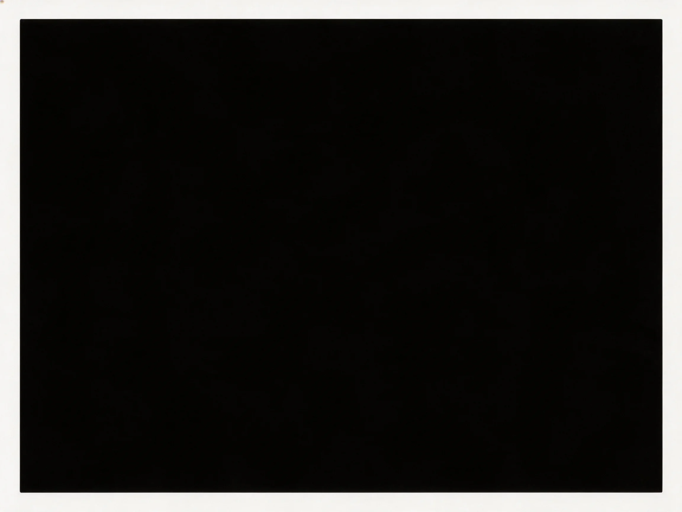 Large solid black rectangle with thin white border