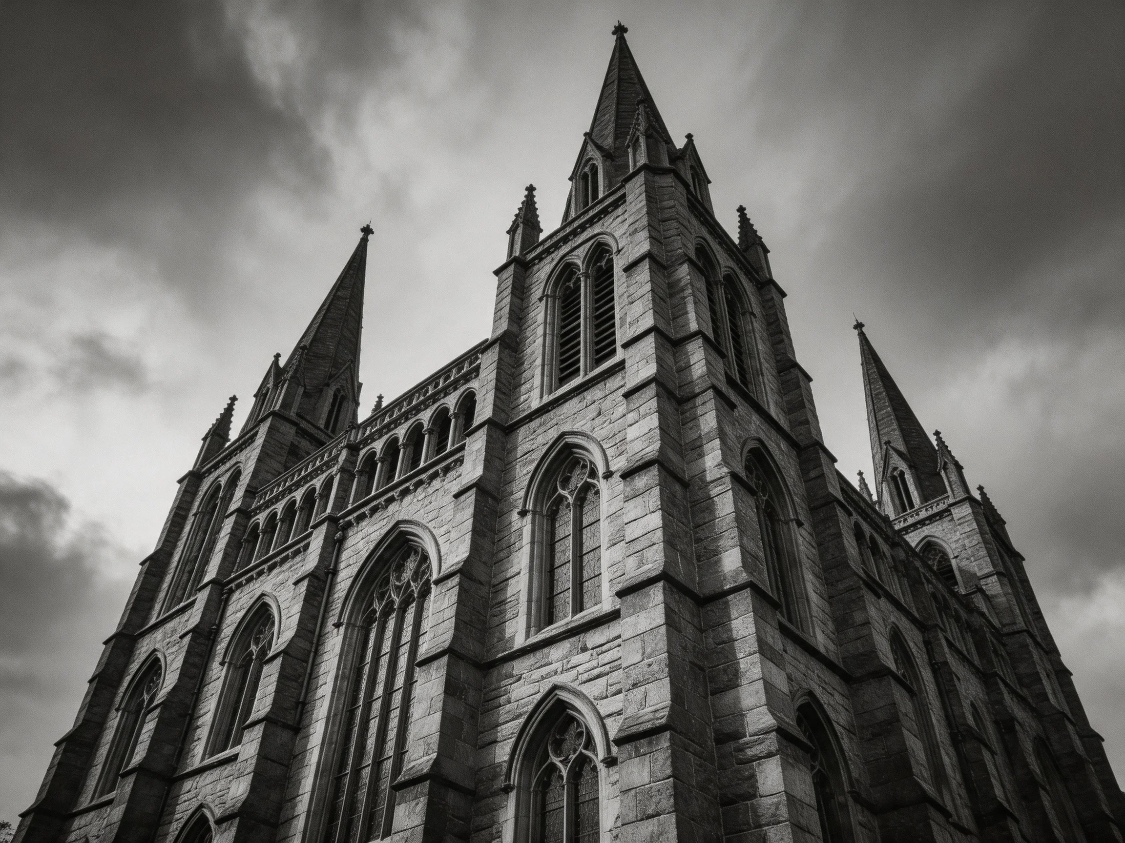 A Gothic Cathedral with Sharp Spires Under Stormy Gray Skies