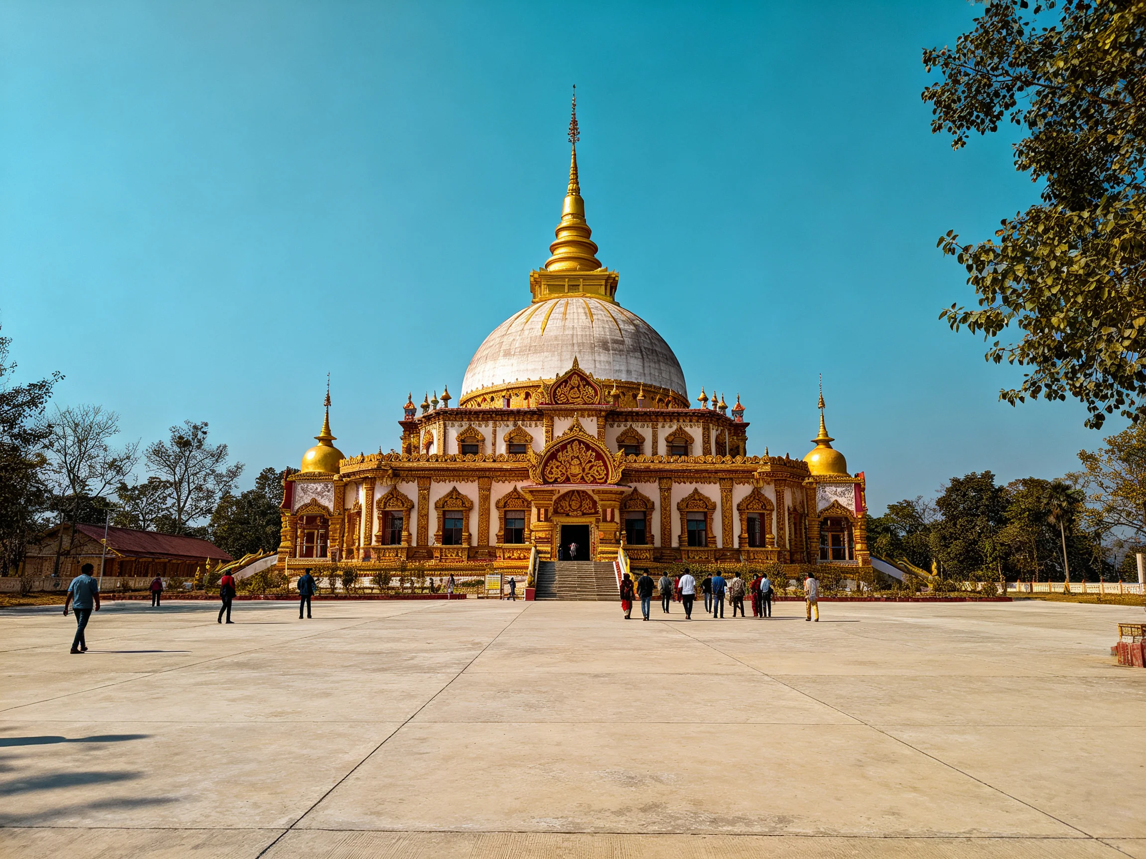 A grand golden-domed temple with ornate architectural details