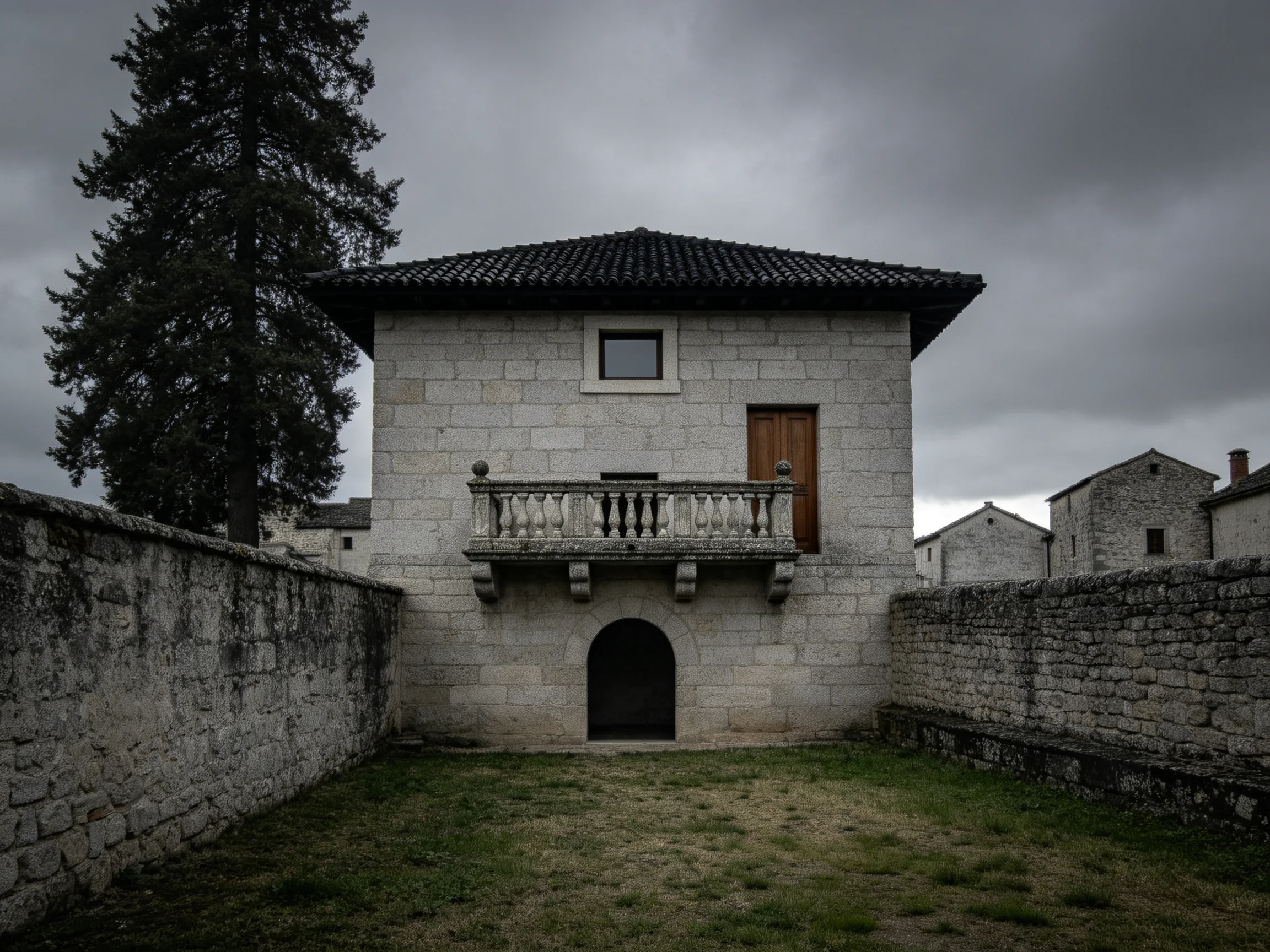 A two - story stone house with a wooden door surrounded by stone walls