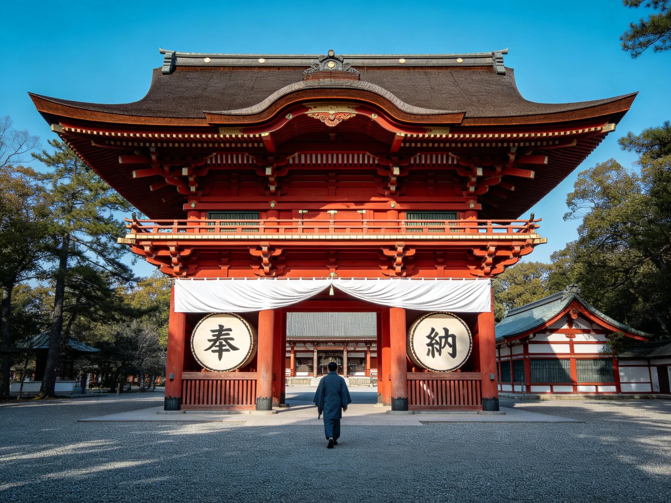 A vibrant red traditional Japanese temple gate with two circular signs