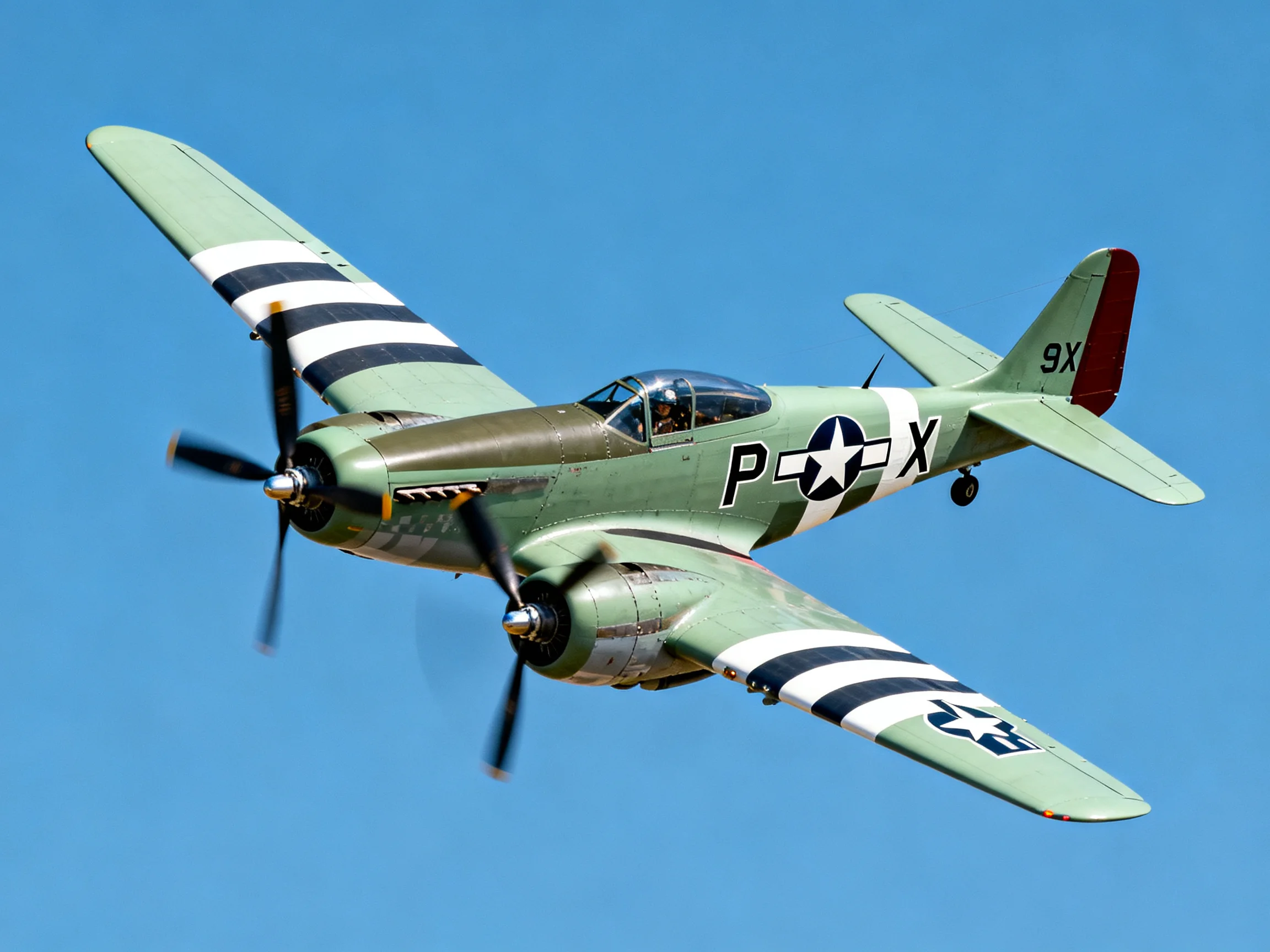 A vintage olive-green P-51 fighter aircraft flying against a clear blue sky