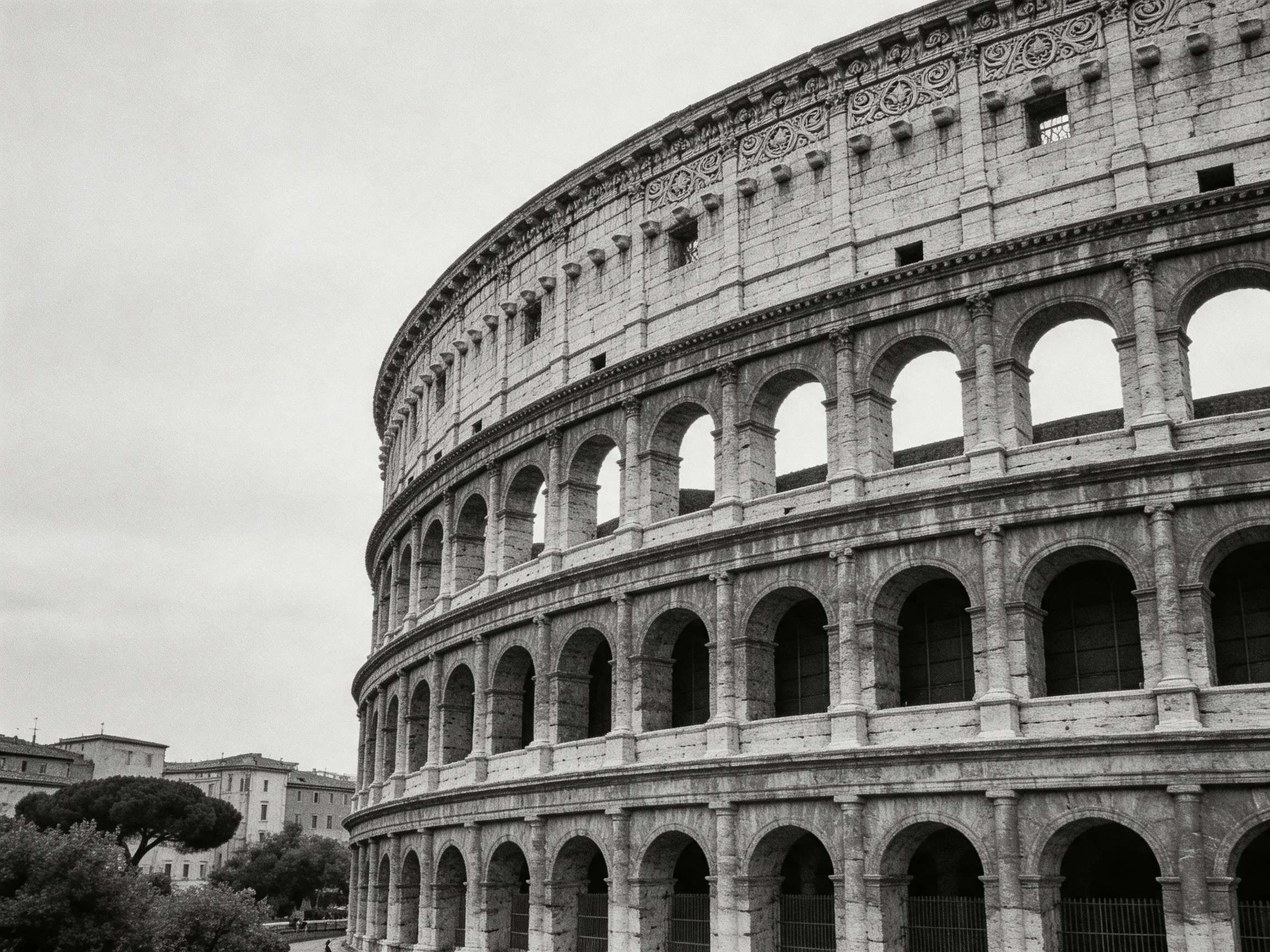 Ancient Colosseum in black and white with weathered stone arches