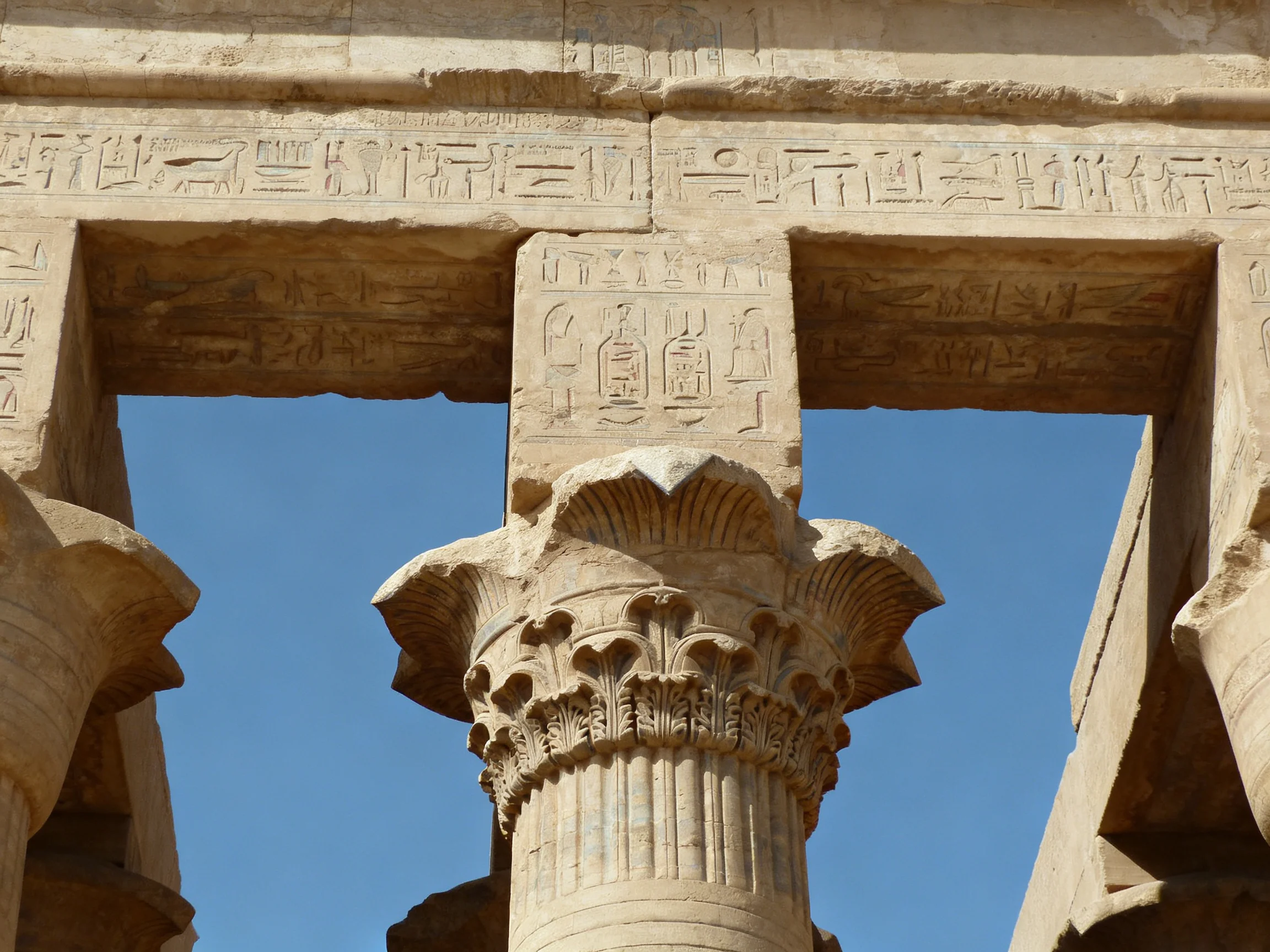 Ancient Egyptian Temple Column with Intricate Hieroglyphic Carvings