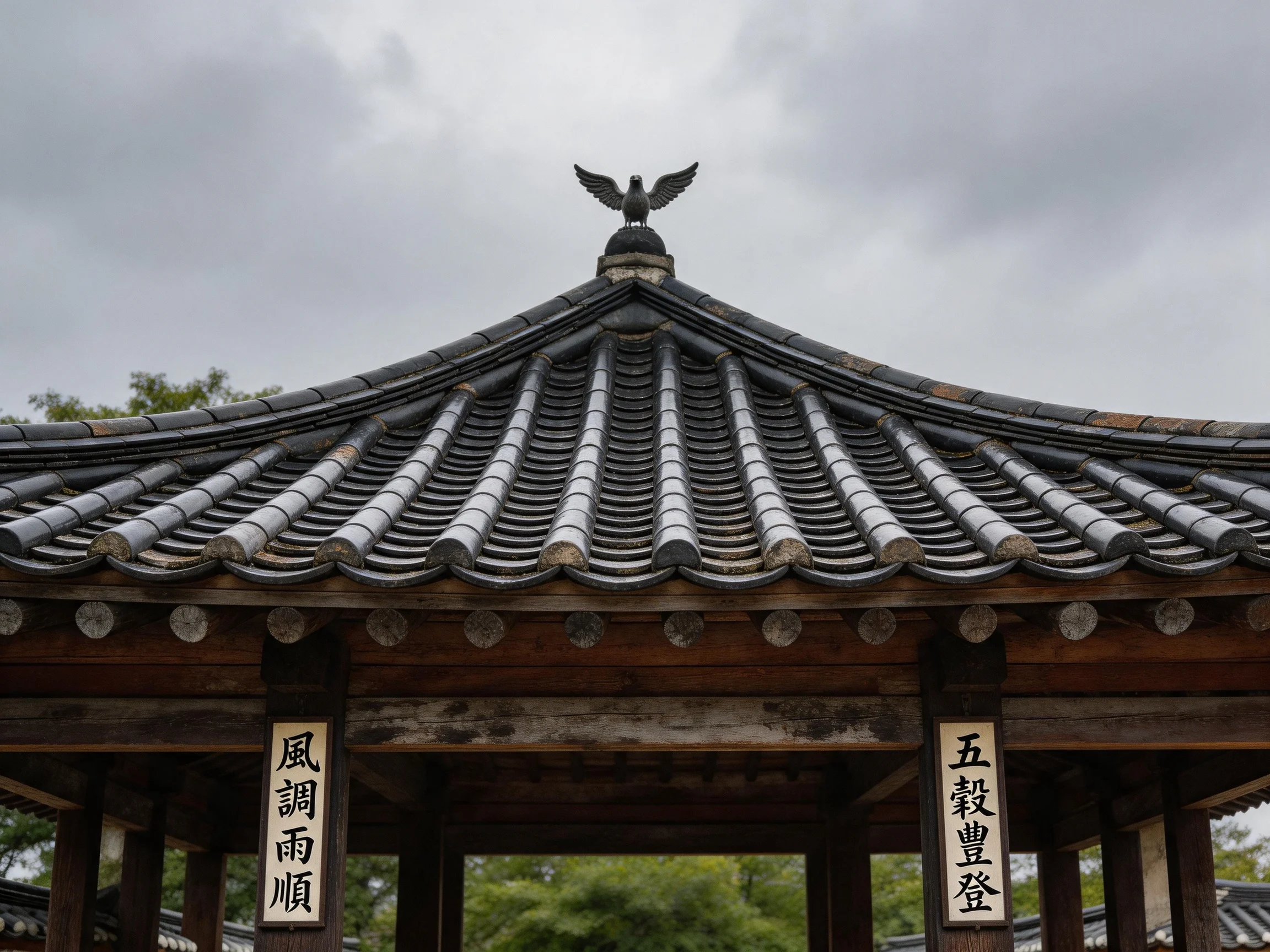 Ancient Pavilion with Curved Tiled Roof and Bird Finial