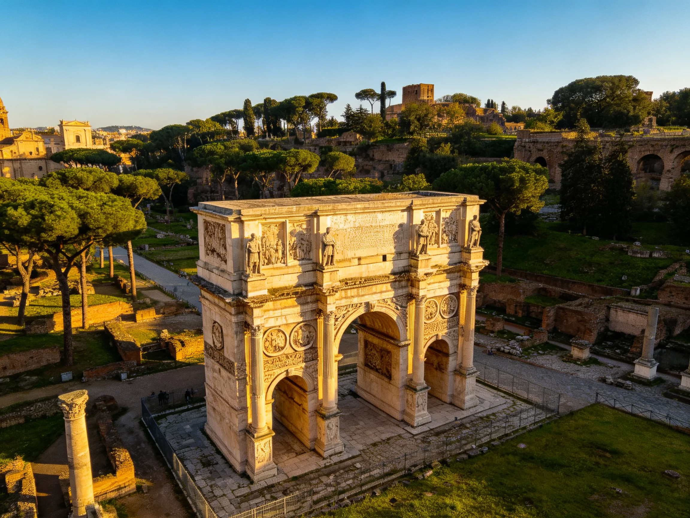 Ancient Roman Arch with Intricate Stone Carvings and Lush Greenery