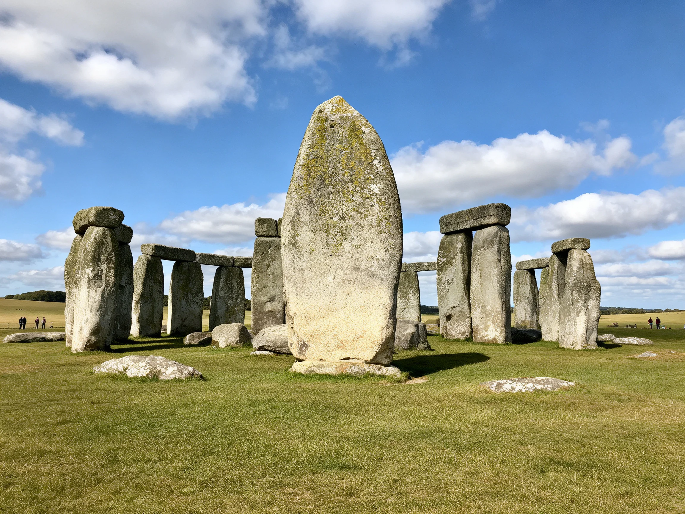 Ancient stone monument with large weathered monoliths under bright sky