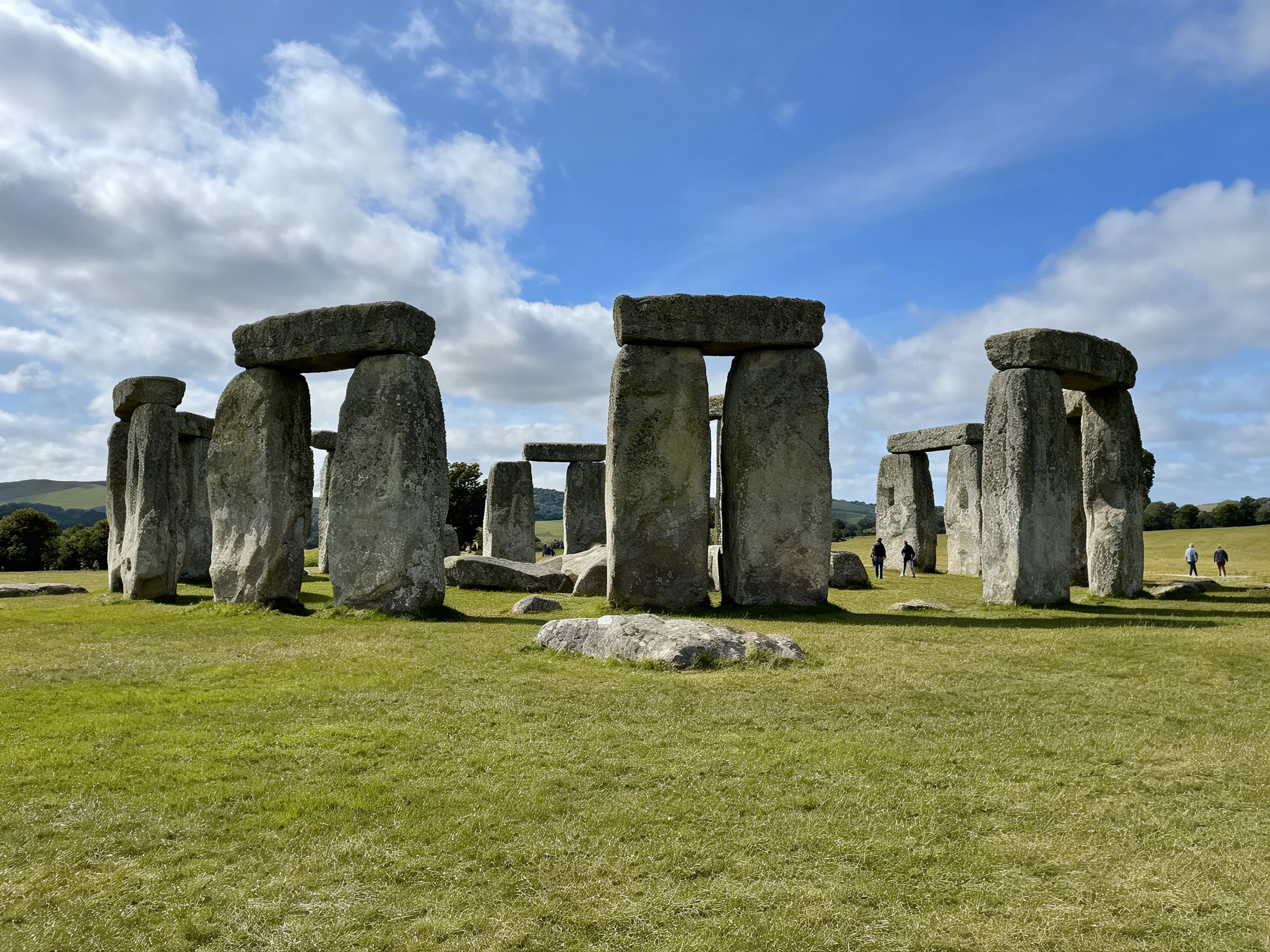 Ancient stone monument with massive gray stones under bright blue sky