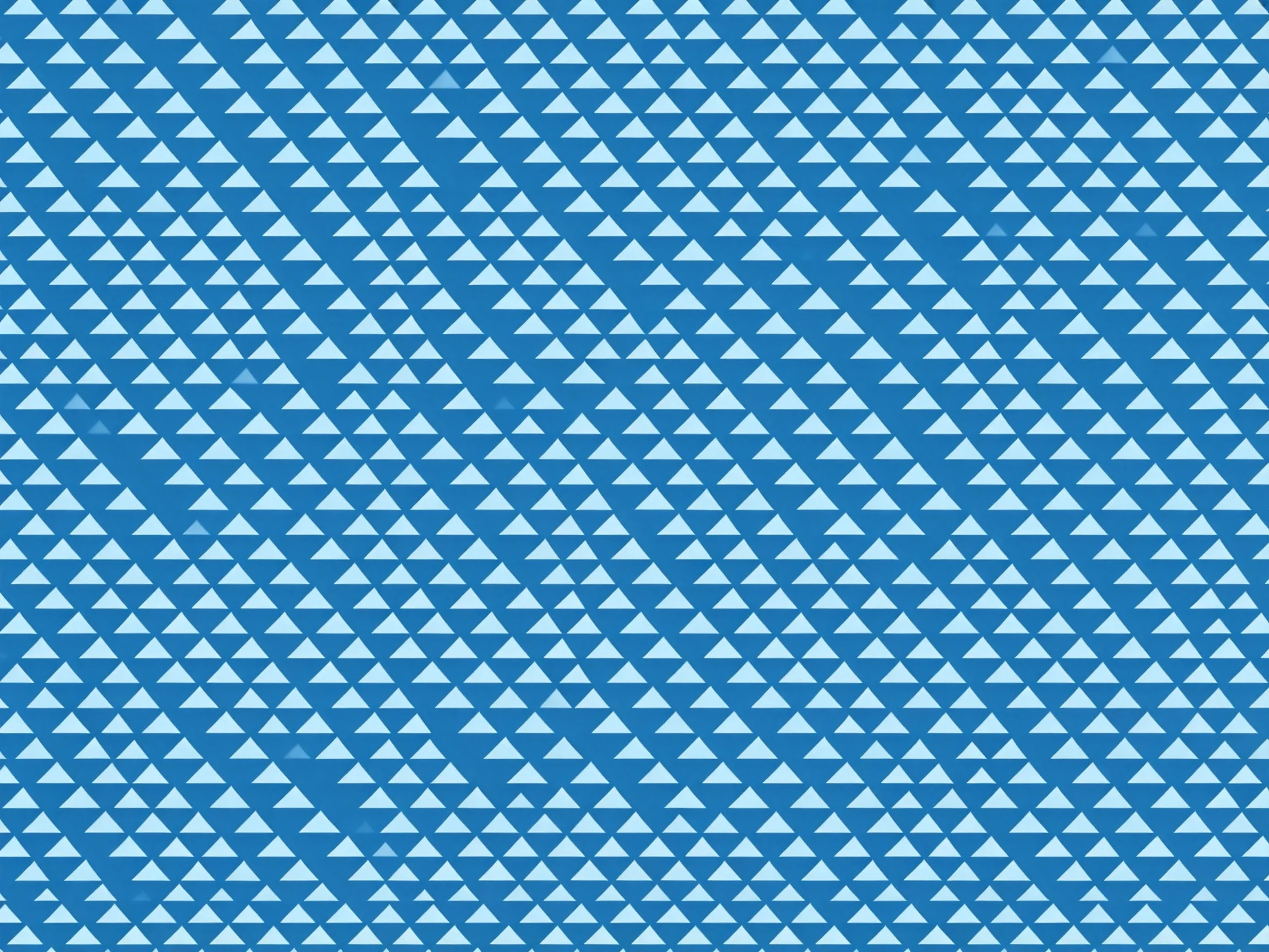 Diagonal white triangle patterns on a deep blue backdrop