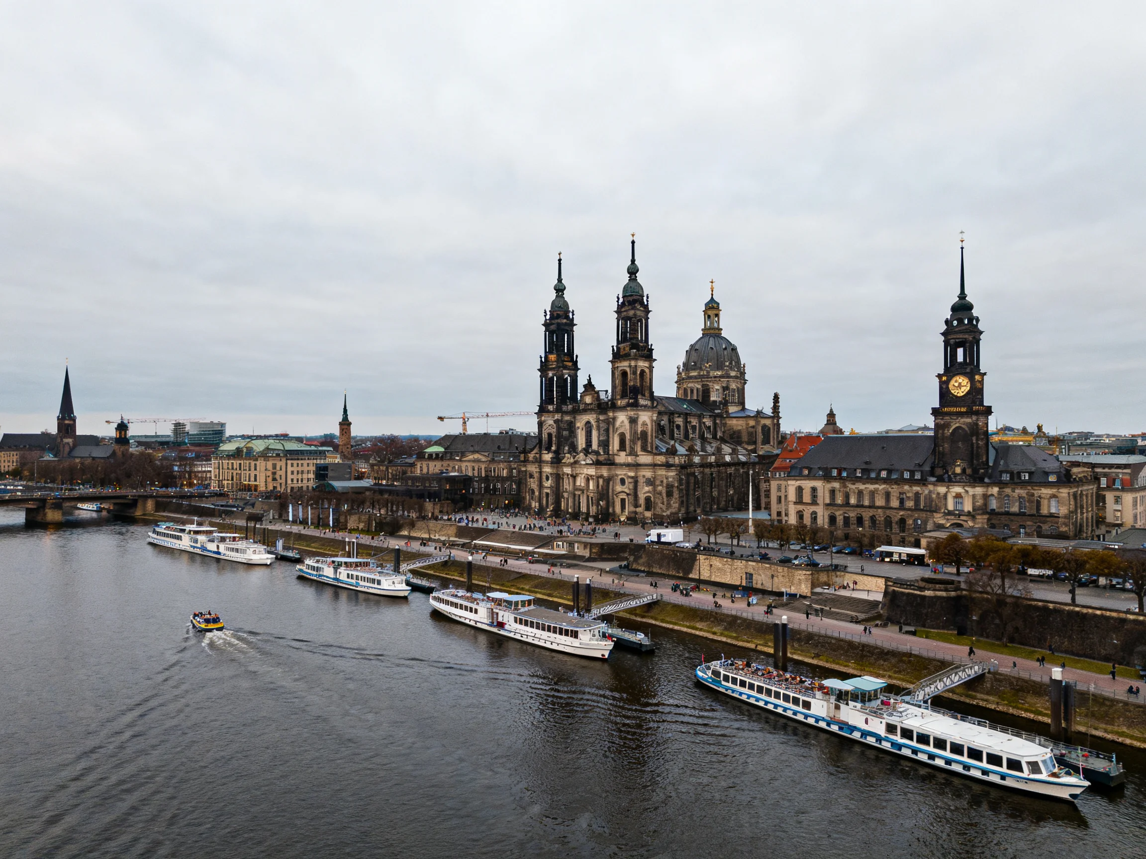 Historic Cathedral and Riverfront with Tourist Boats