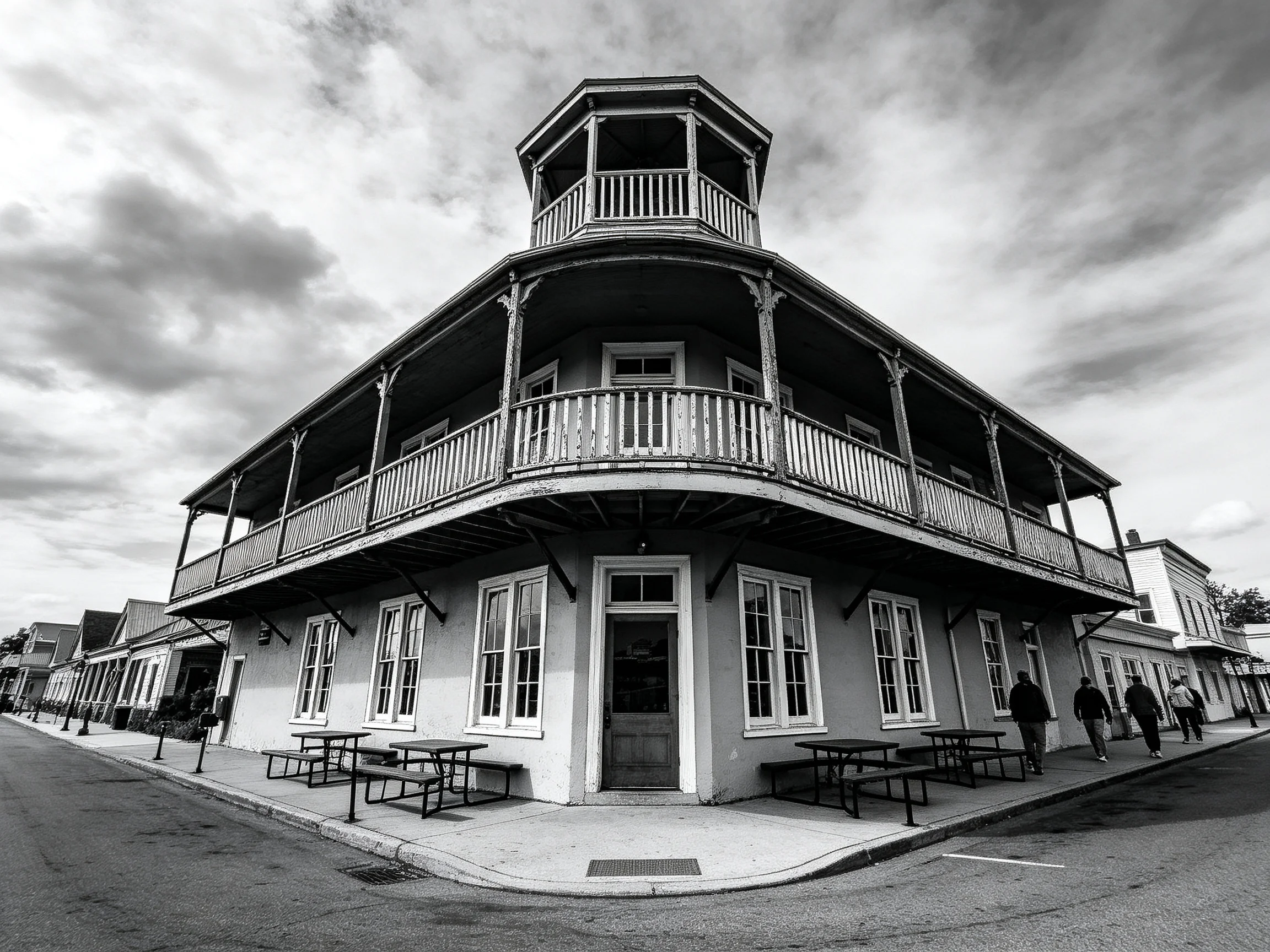 Historic Two-Story Corner Building with Balconies and Tower