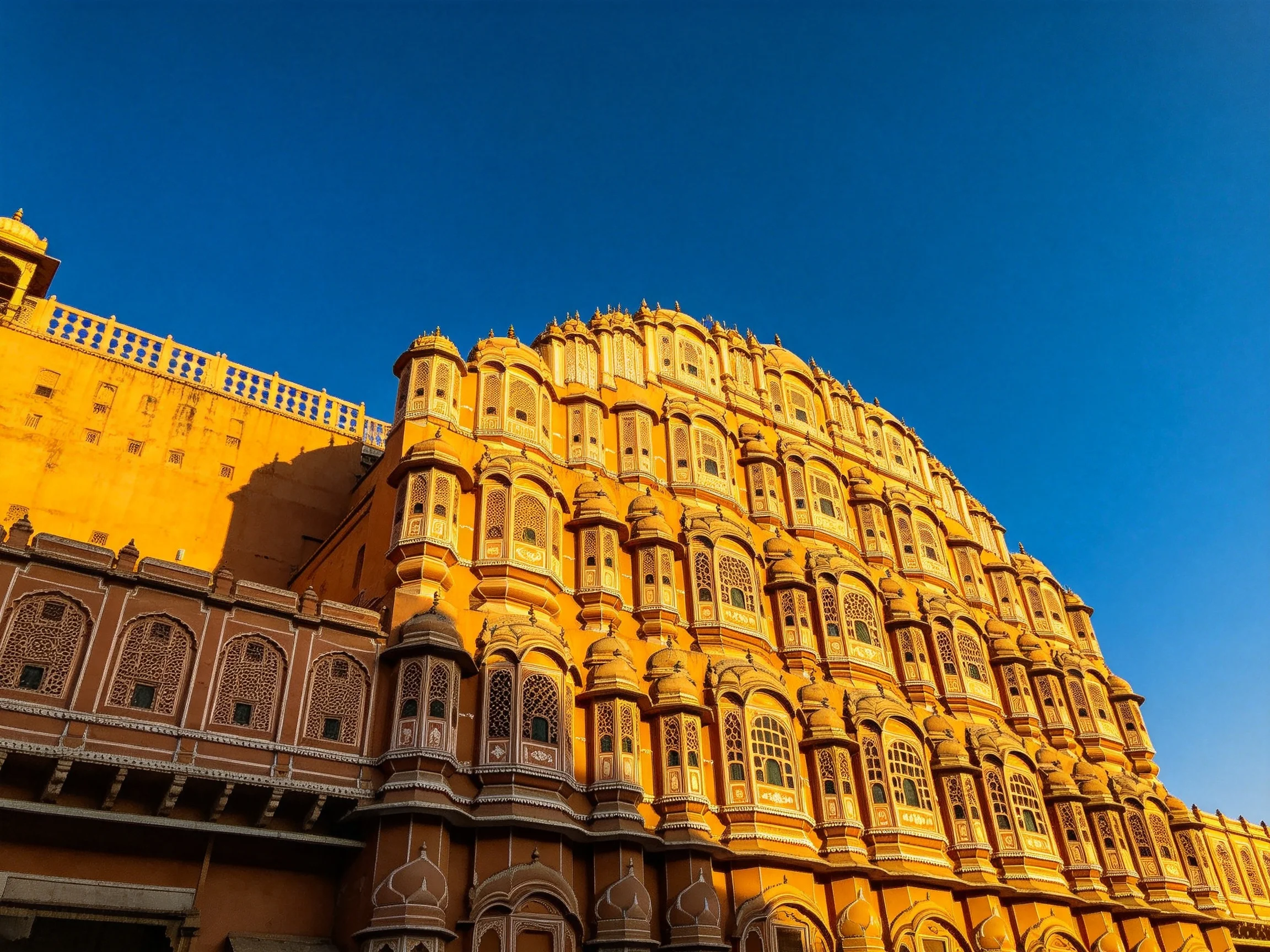 Intricately carved multi-windowed palace facade