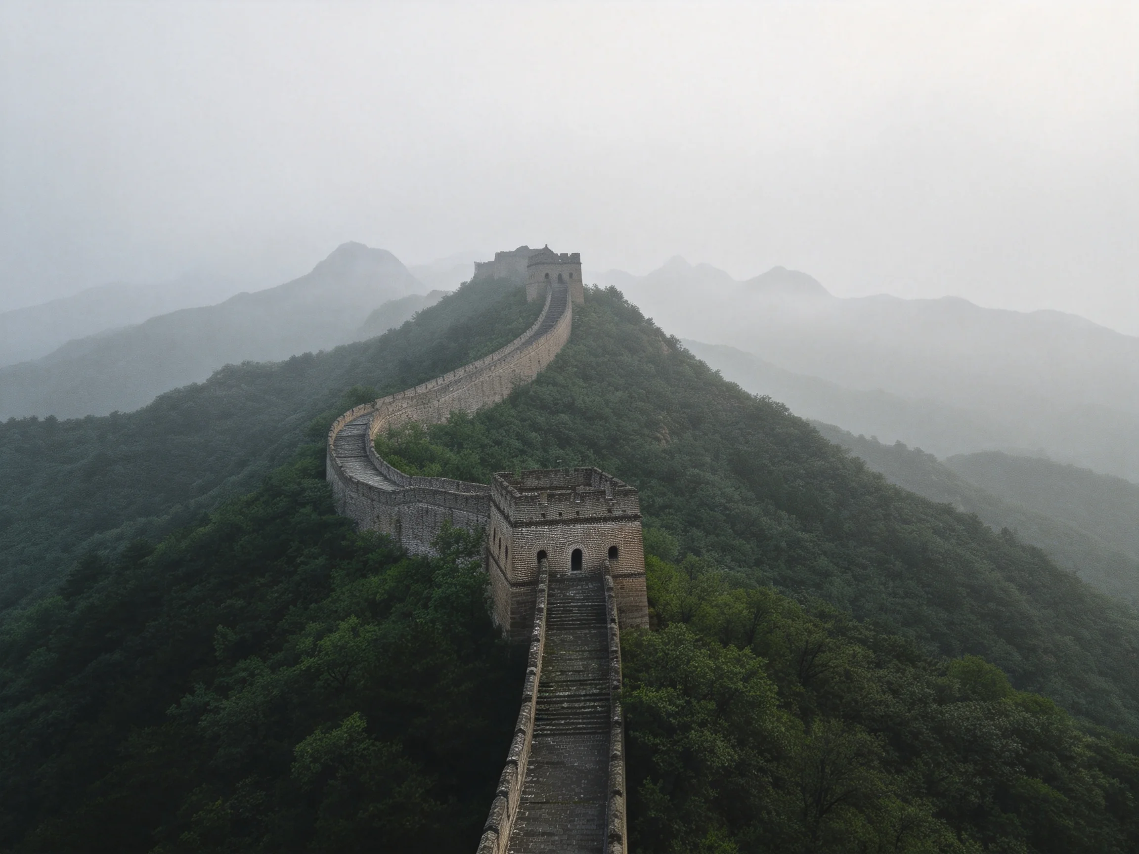 Misty Mountainous Terrain with Ancient Stone Great Wall