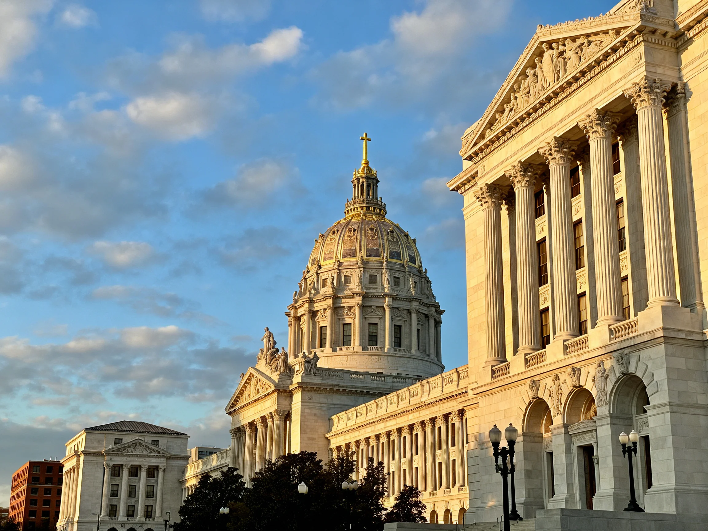 Ornate government building with grand columns and golden dome