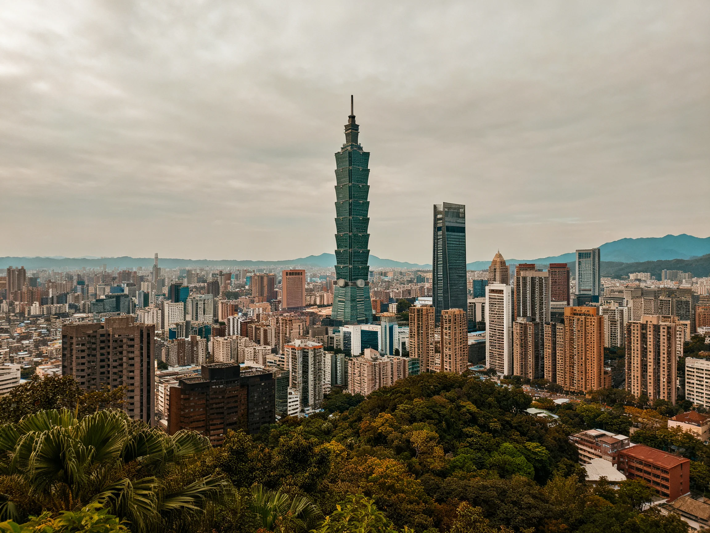 Taipei 101 Tower Stands Tall Among Diverse Urban Buildings and Greenery
