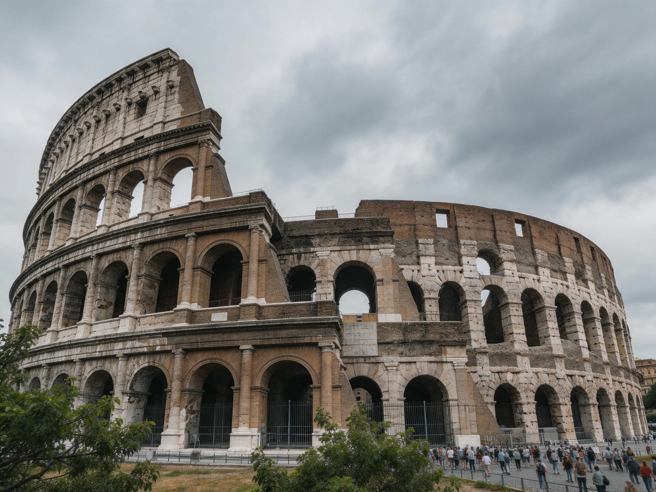The ancient Colosseum with weathered stone arches under an overcast sky