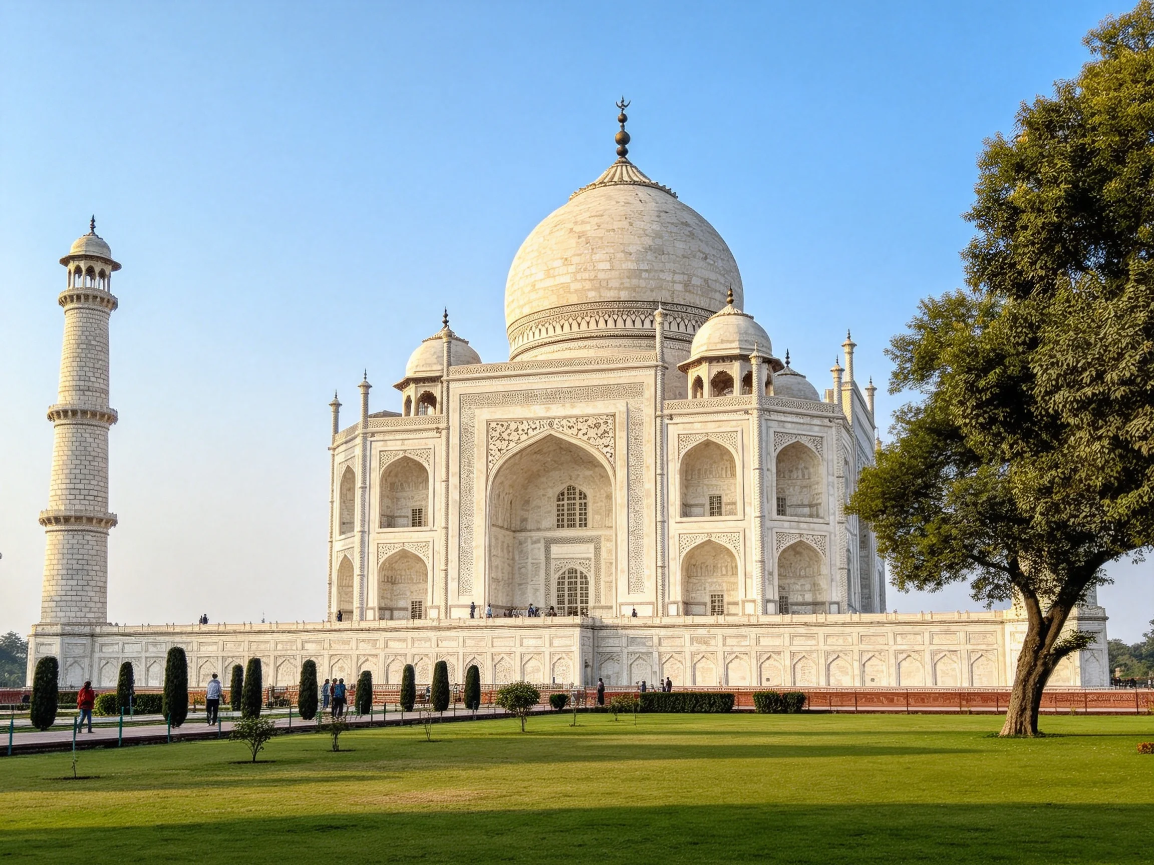 The grand Taj Mahal with white marble domes and gardens