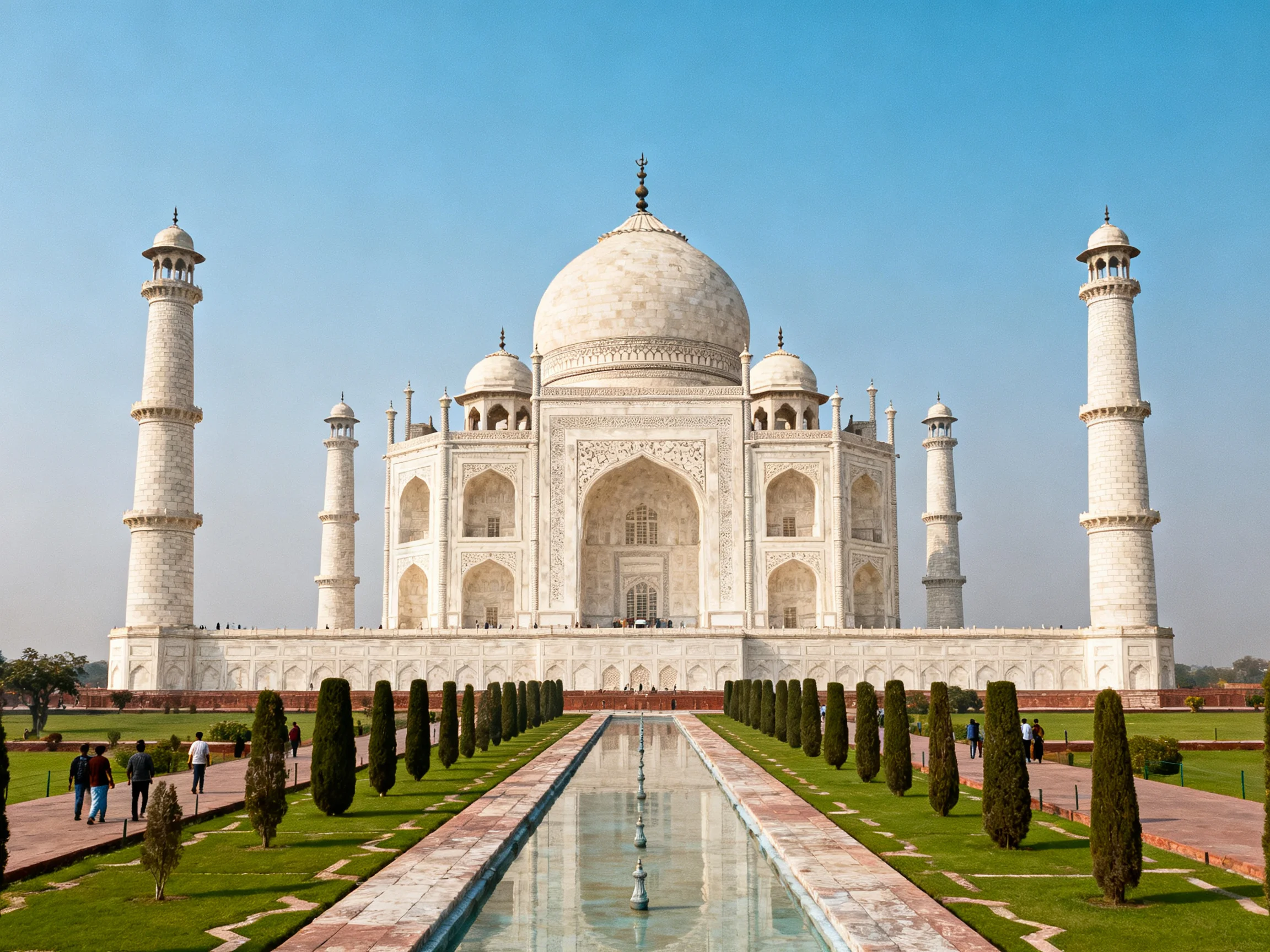 The majestic white marble Taj Mahal with four minarets and central dome