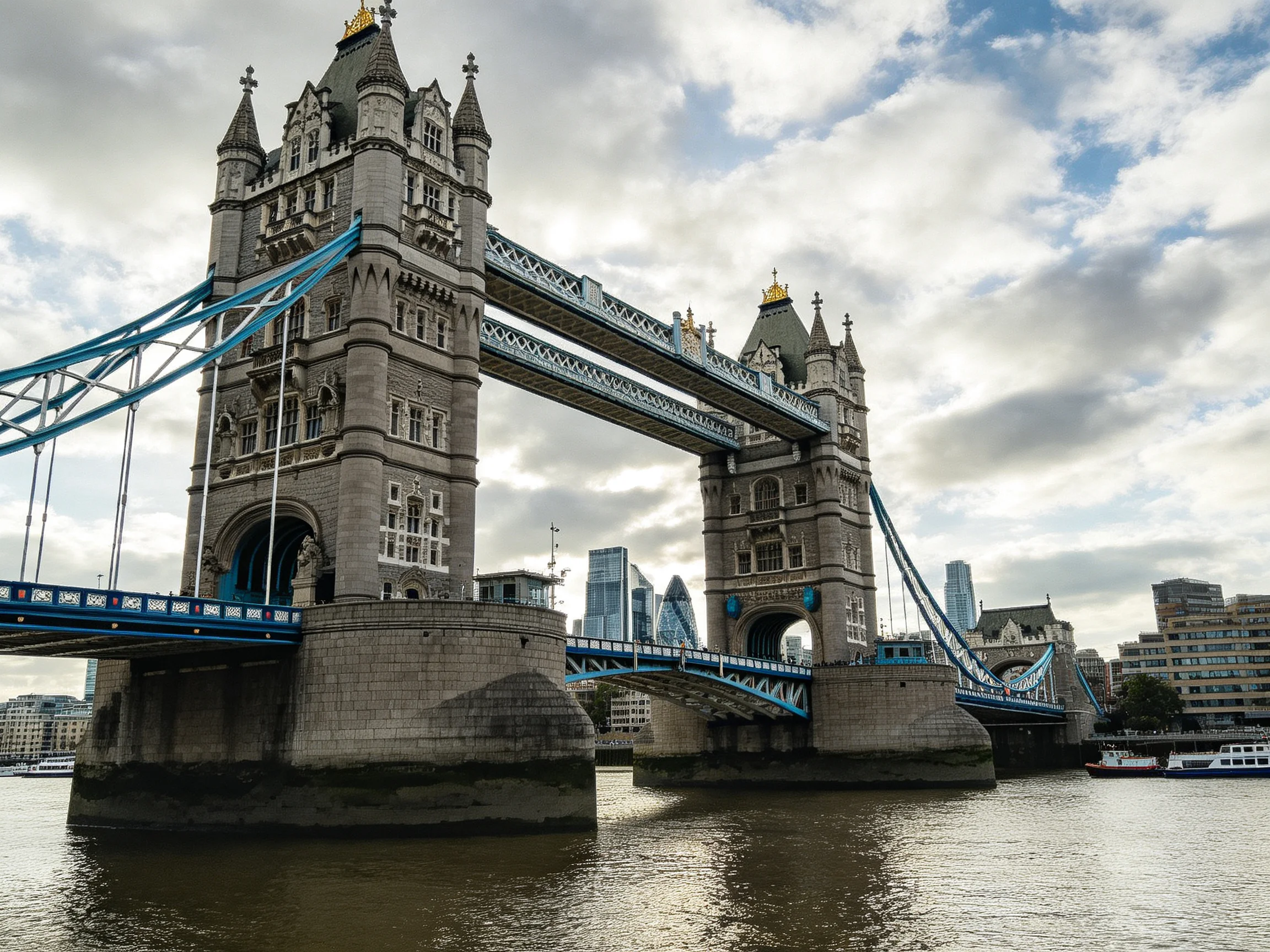 Tower Bridge spanning the River Thames with blue suspension cables