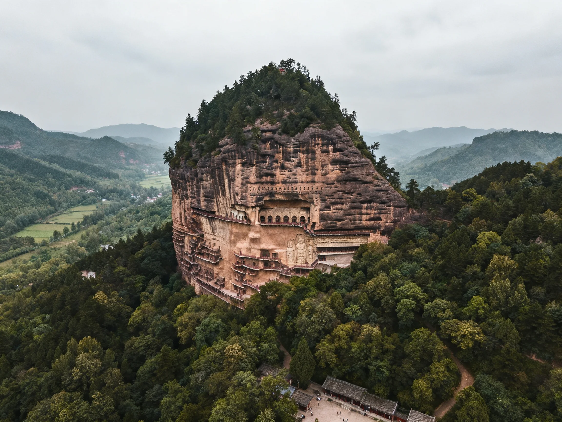 Towering Cliff with Ancient Rock Art in Lush Forests