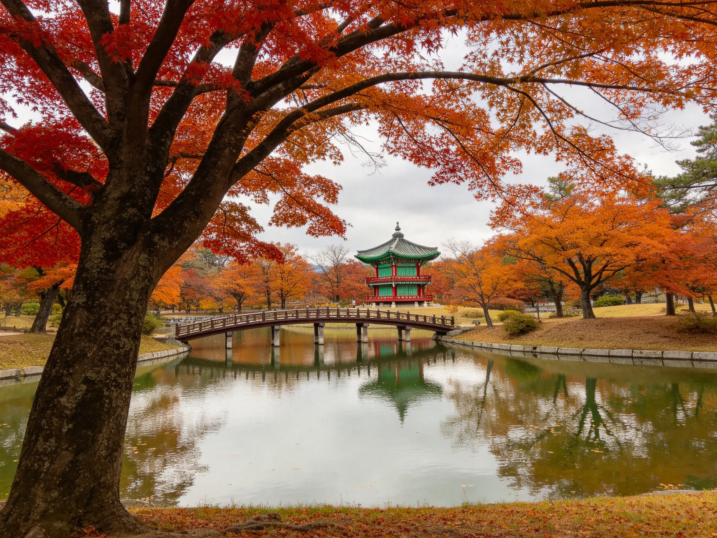 Vibrant autumn foliage frames a traditional pavilion over a calm pond
