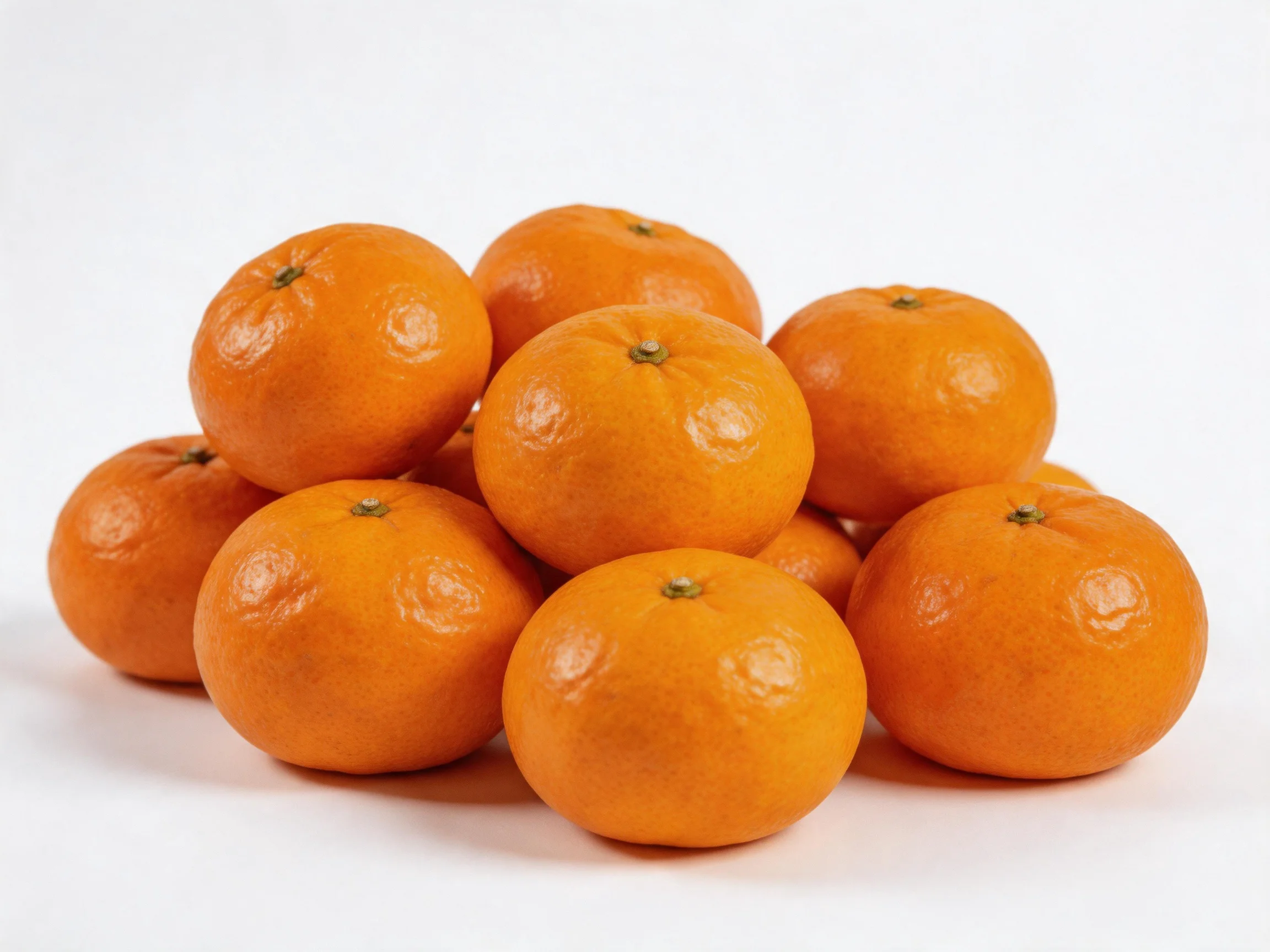 A cluster of bright orange citrus fruits piled closely