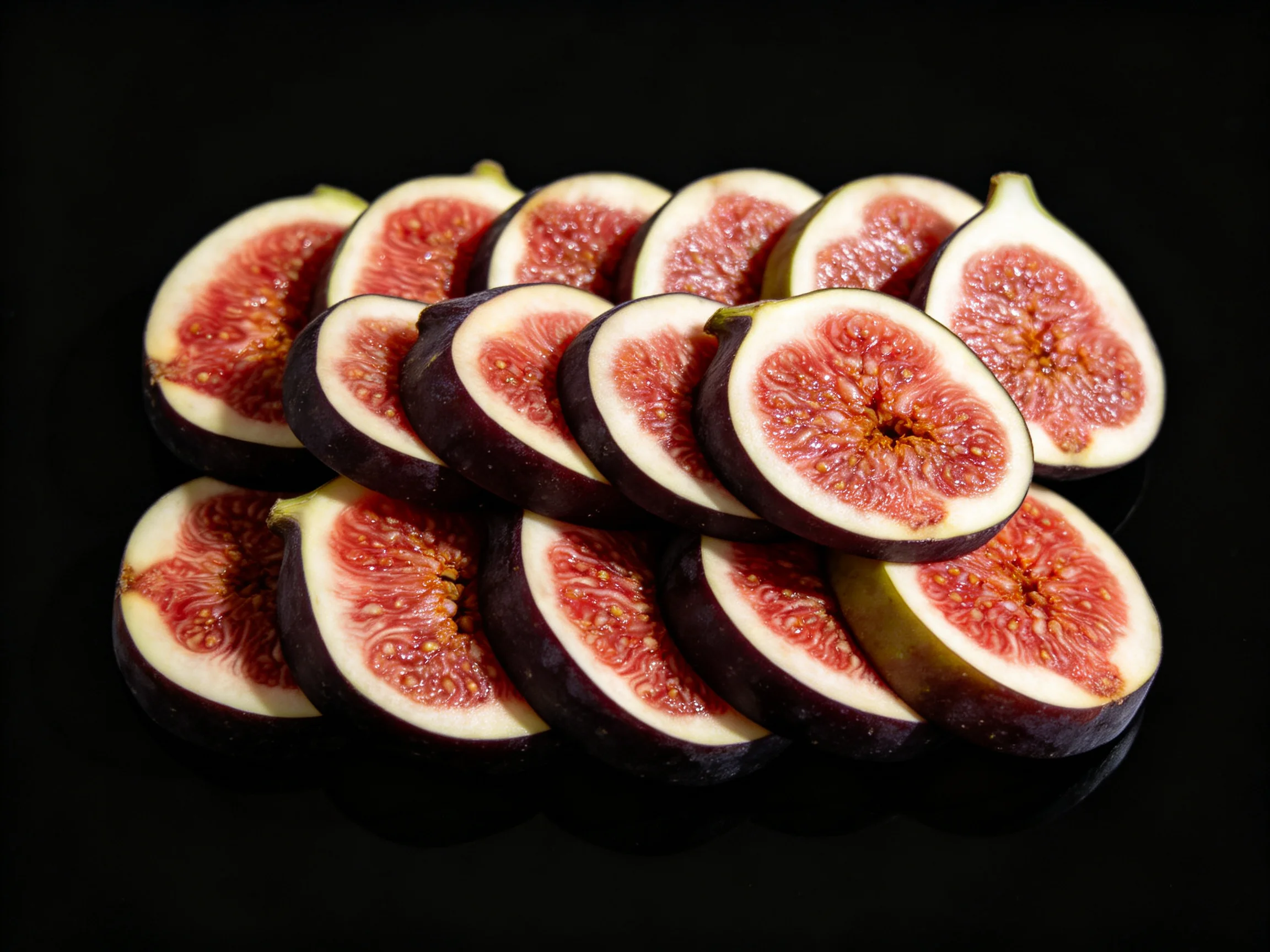 Freshly sliced figs with deep purple skins and vibrant interiors