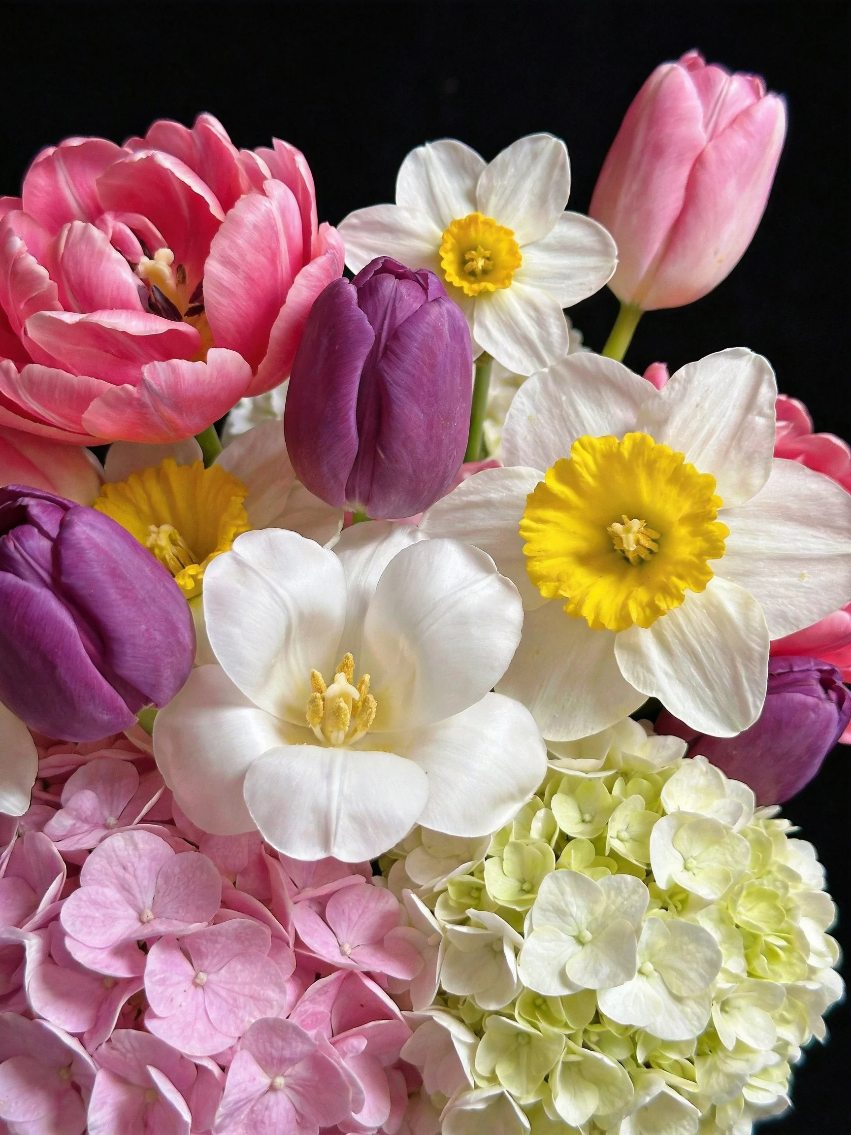 Colorful mixed-flower bouquet with pink, purple, white blooms