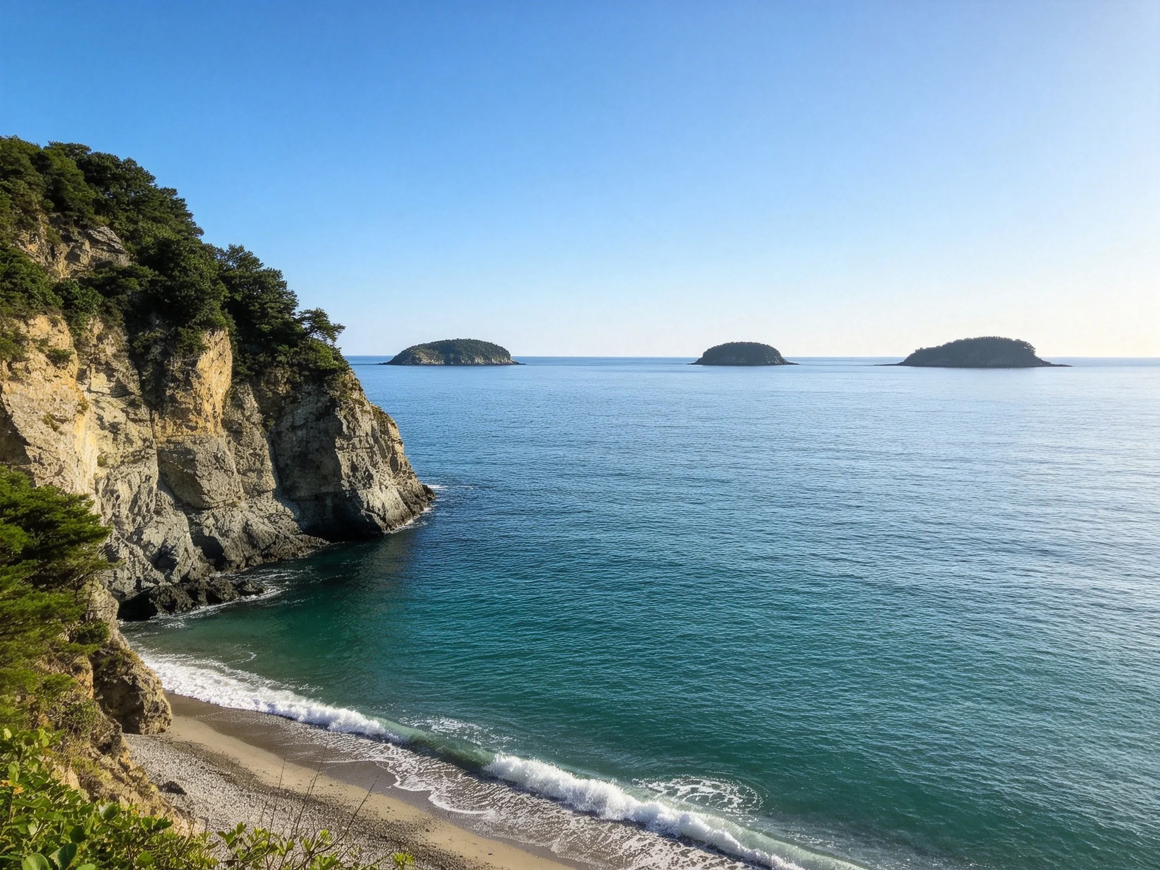 Cliffside Beach with Turquoise Waters and Three Small Islands