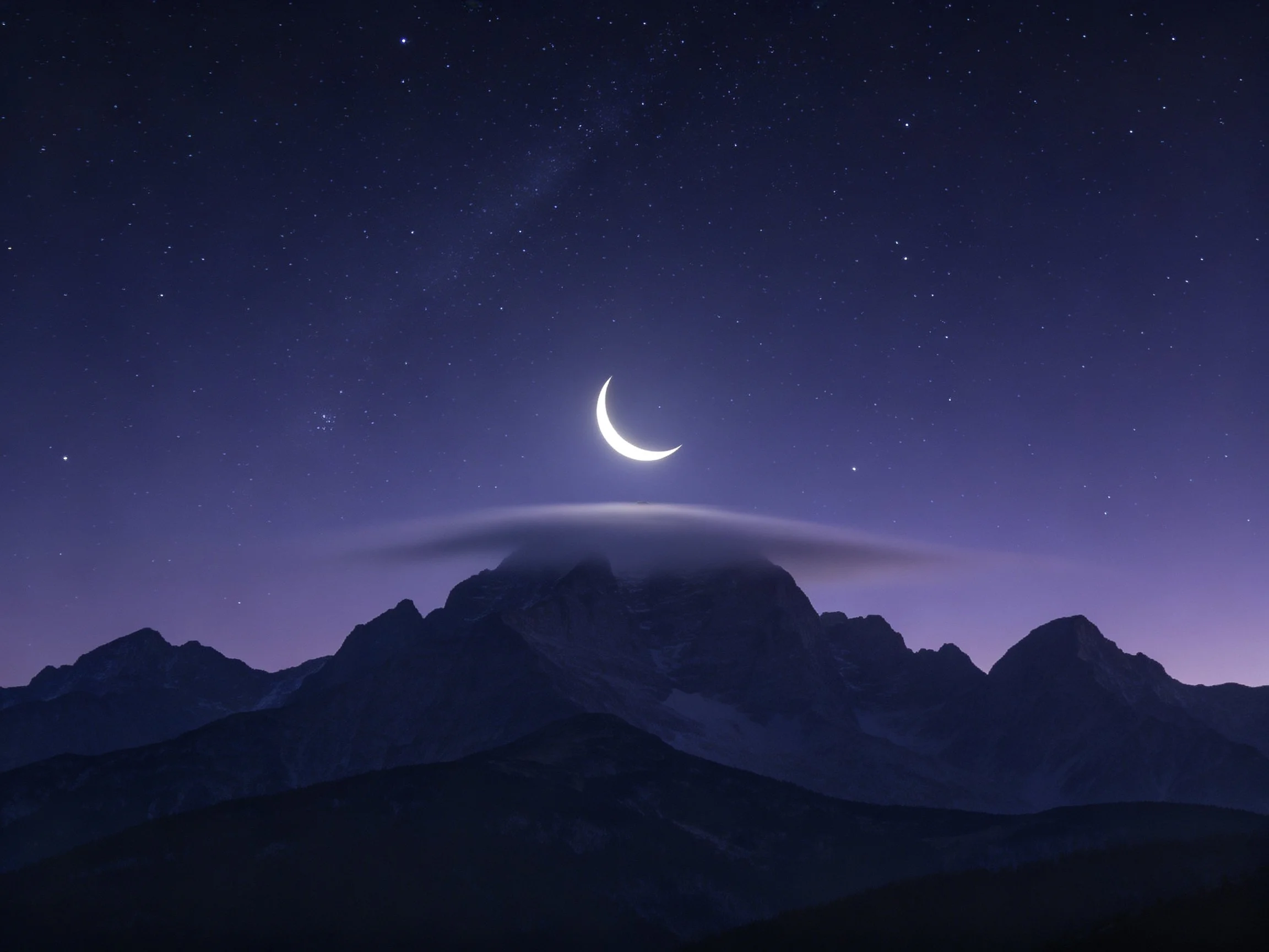 Crescent Moon Shines Above Dark Mountain Peaks Under Starry Night Sky