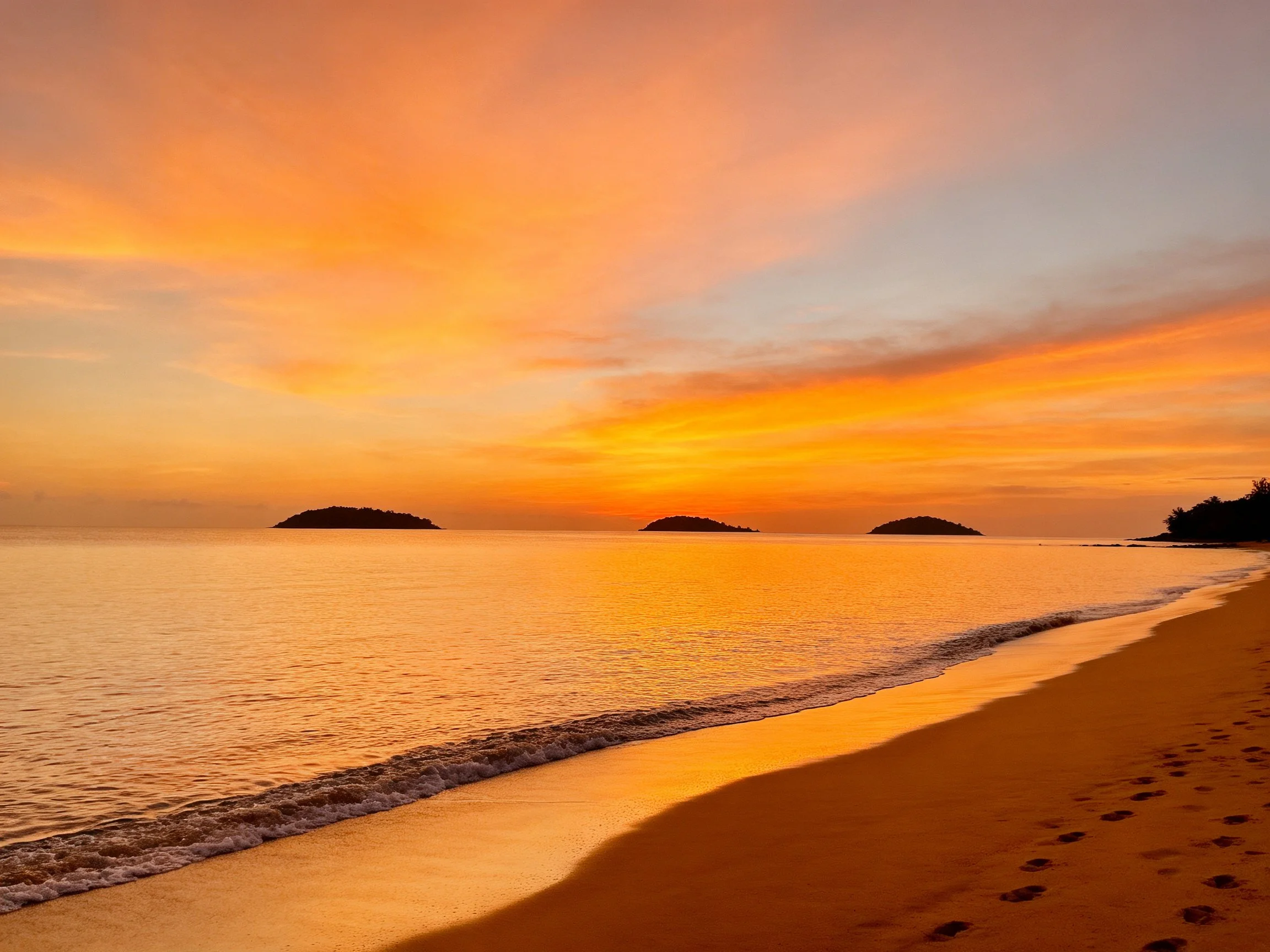 Golden Sunset Over Calm Beach With Three Islands