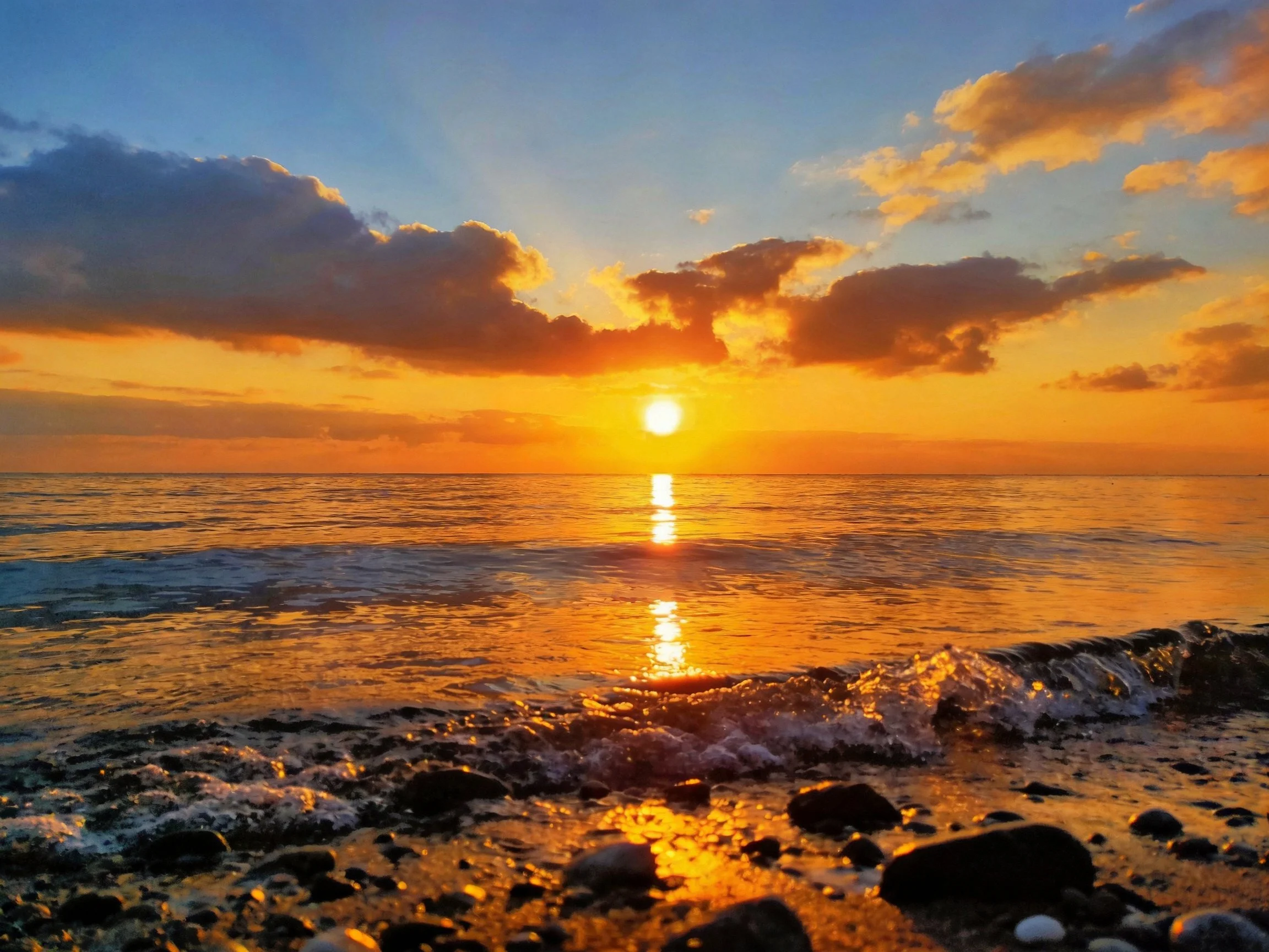 Golden Sunset Over Calm Ocean Waters