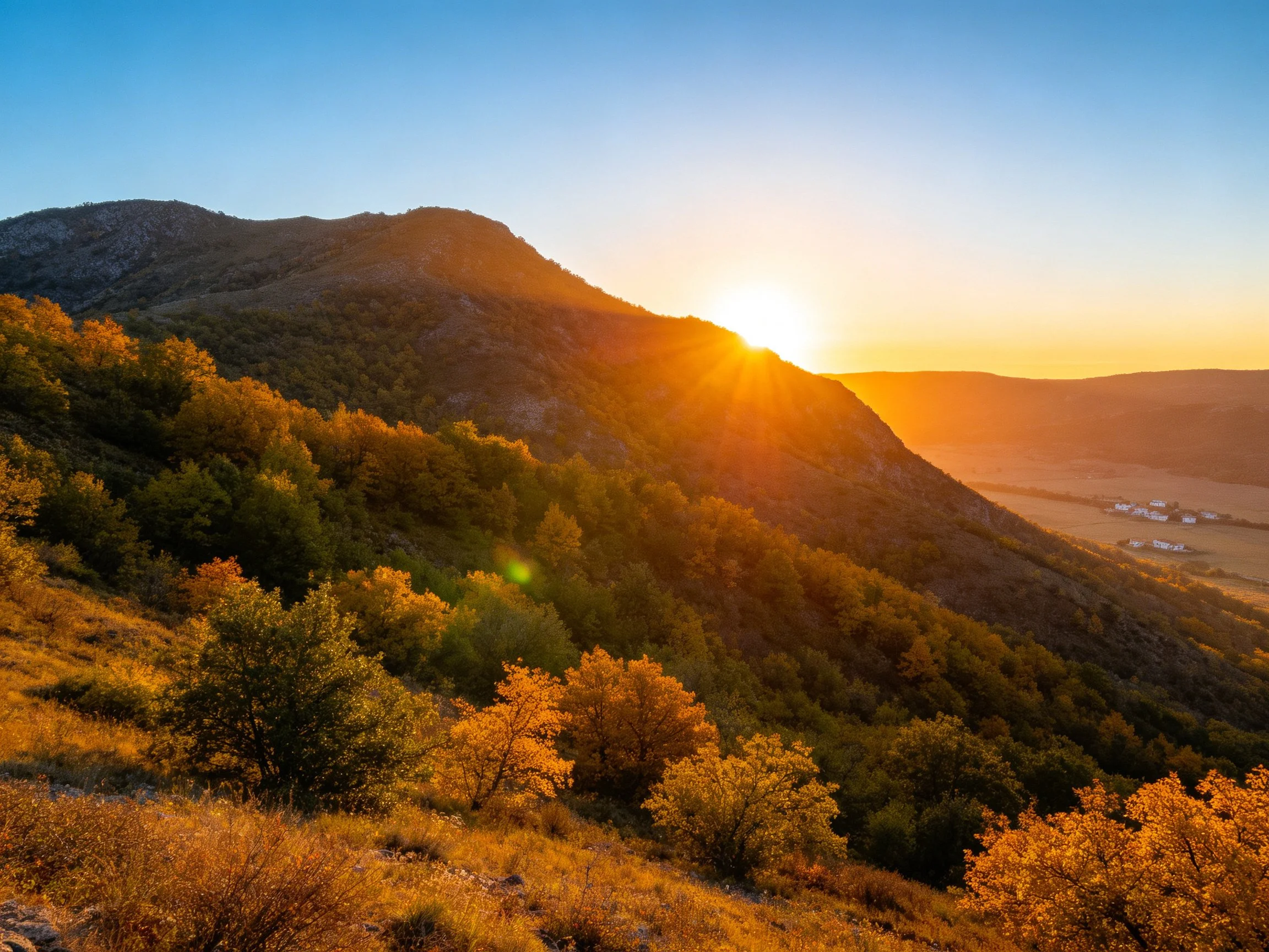 Golden Sunset Over Rolling Hills and Autumn Forests