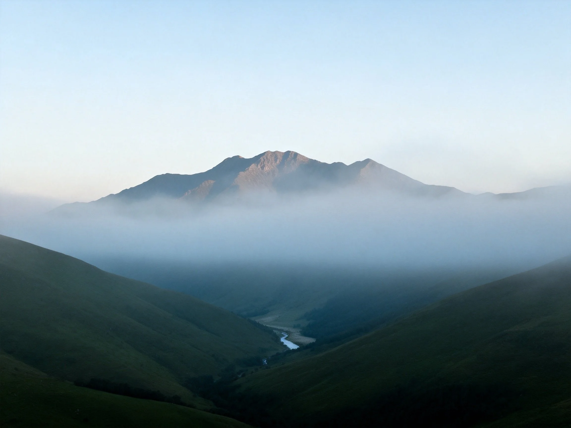 Misty Mountain Peaks Over Green Valley Landscapes