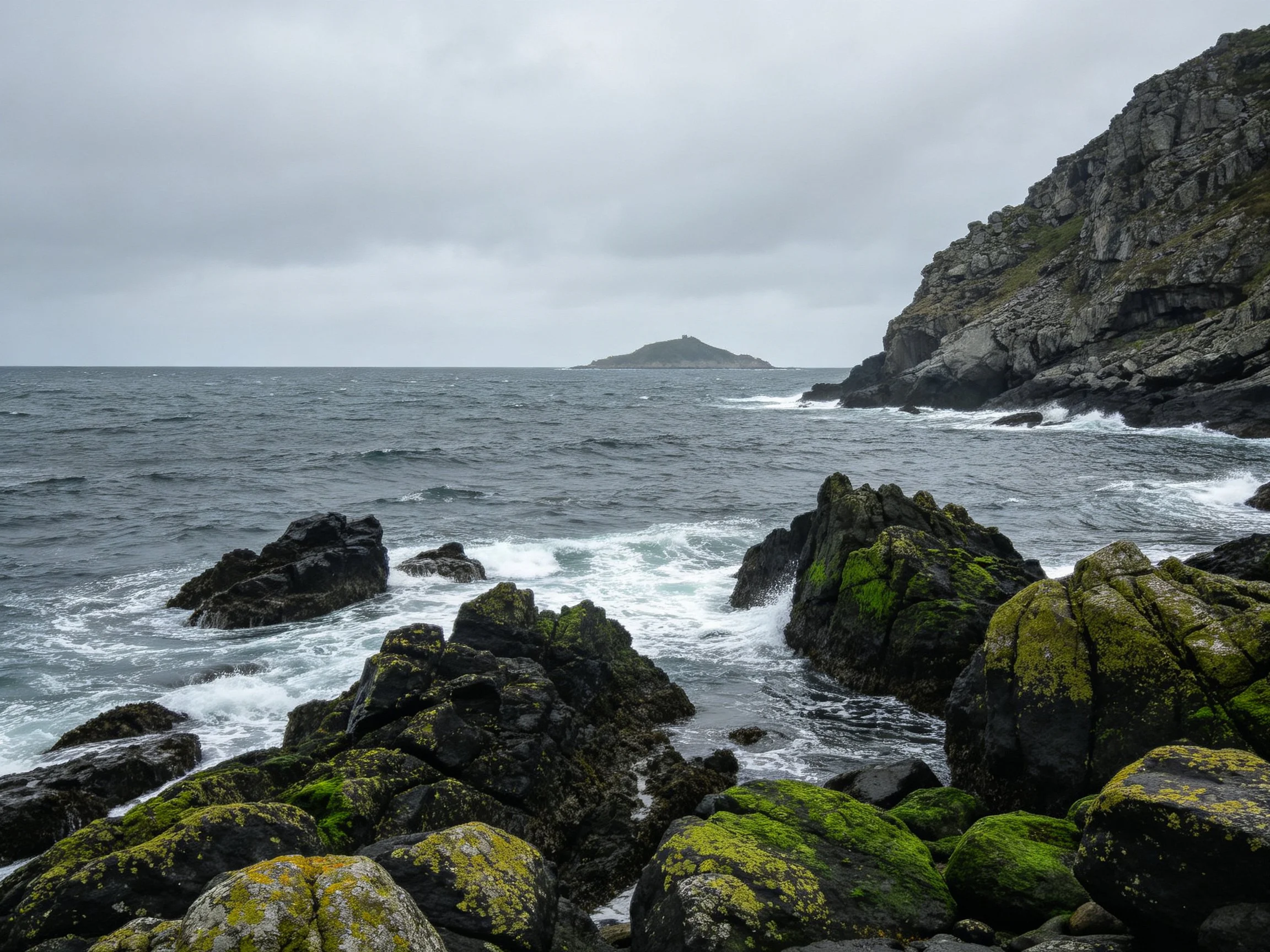 Moss-Covered Coastal Rocks by Stormy Ocean Cliffs