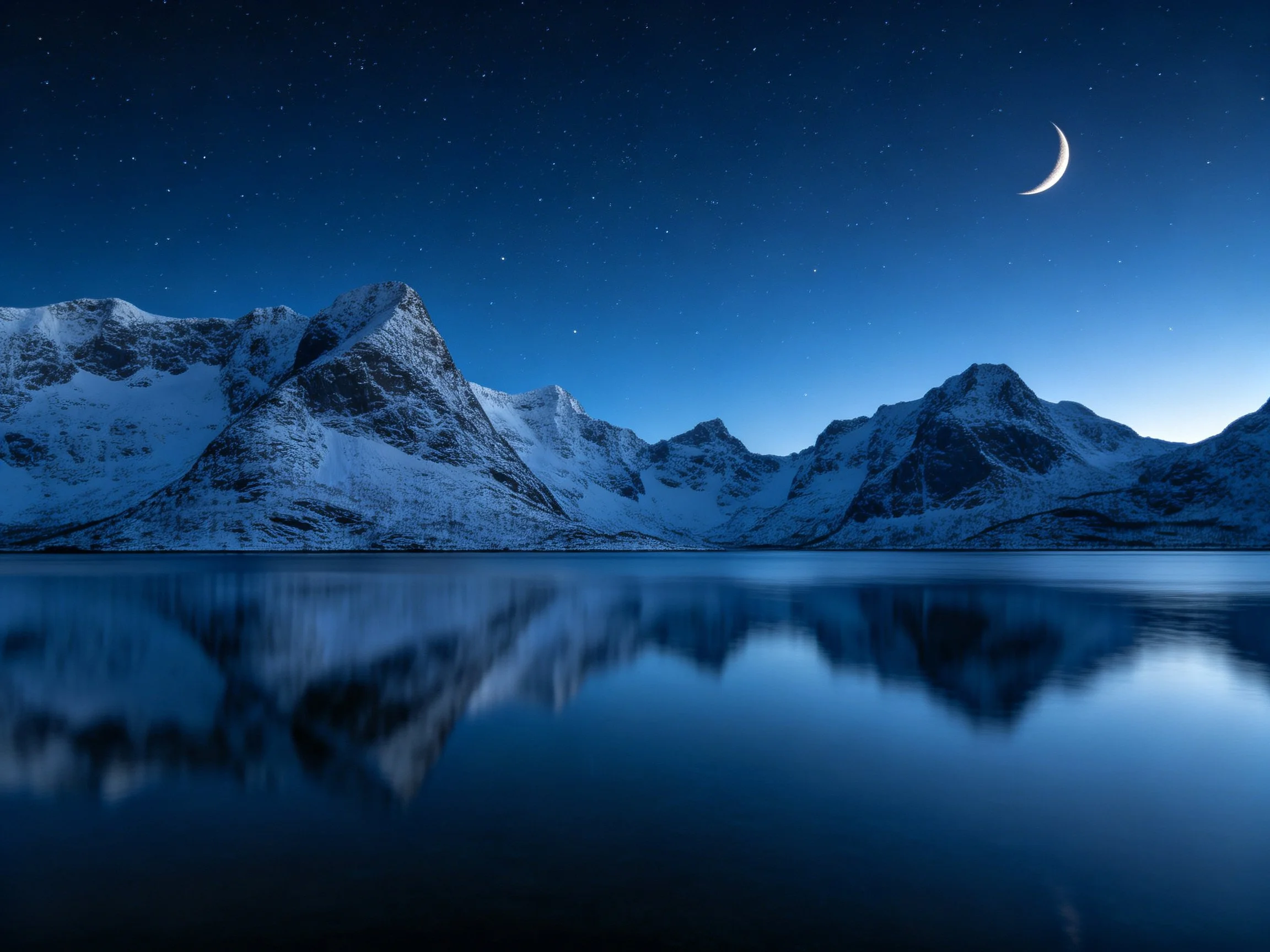 Snow-Capped Peaks Reflecting Under Crescent Moonlight
