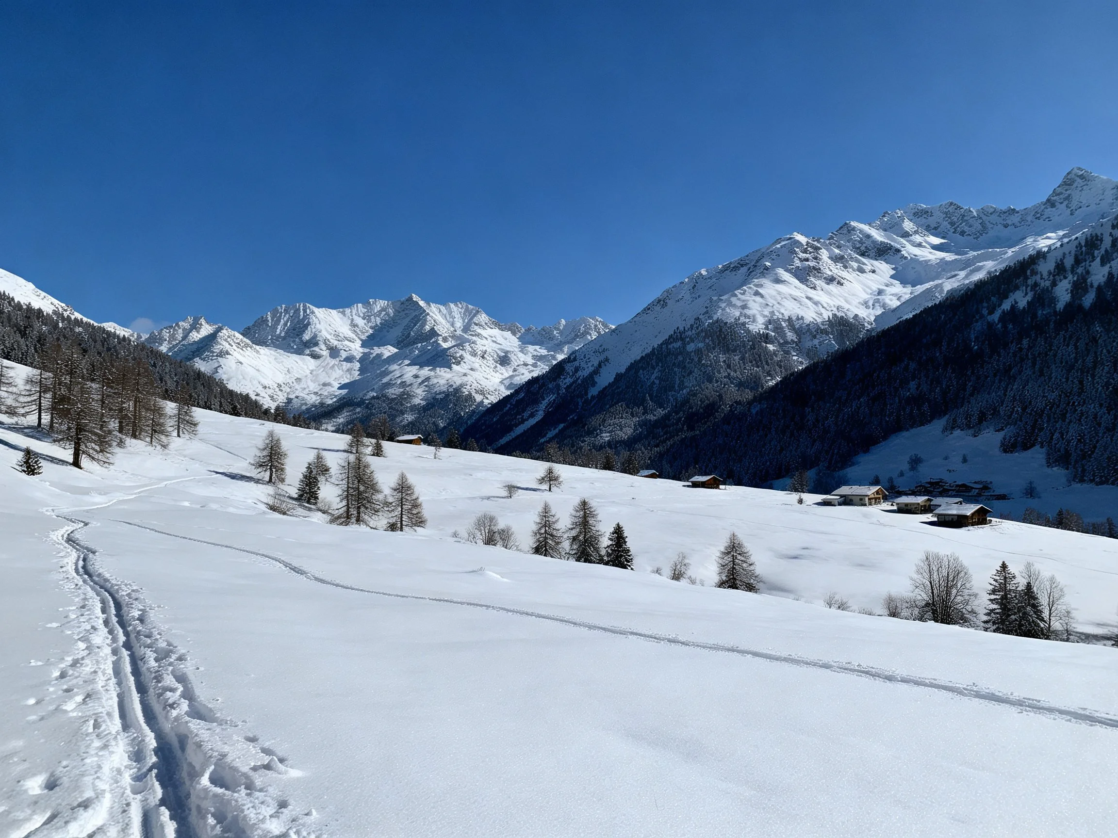 Snow-Covered Alpine Valley with Majestic Peaks