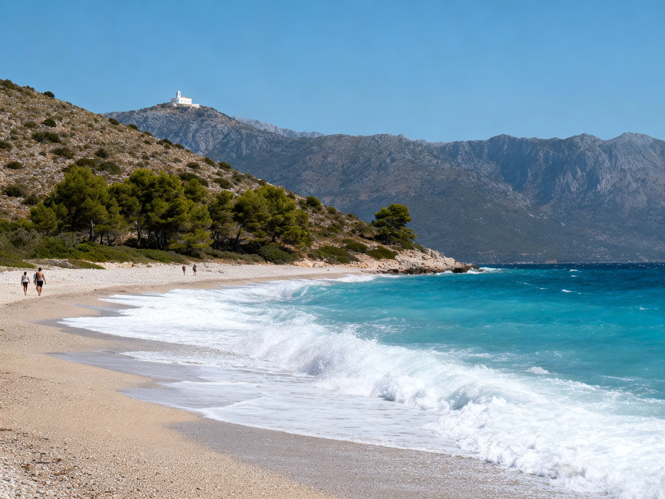 Turquoise waves crash onto a sandy beach with forested hills